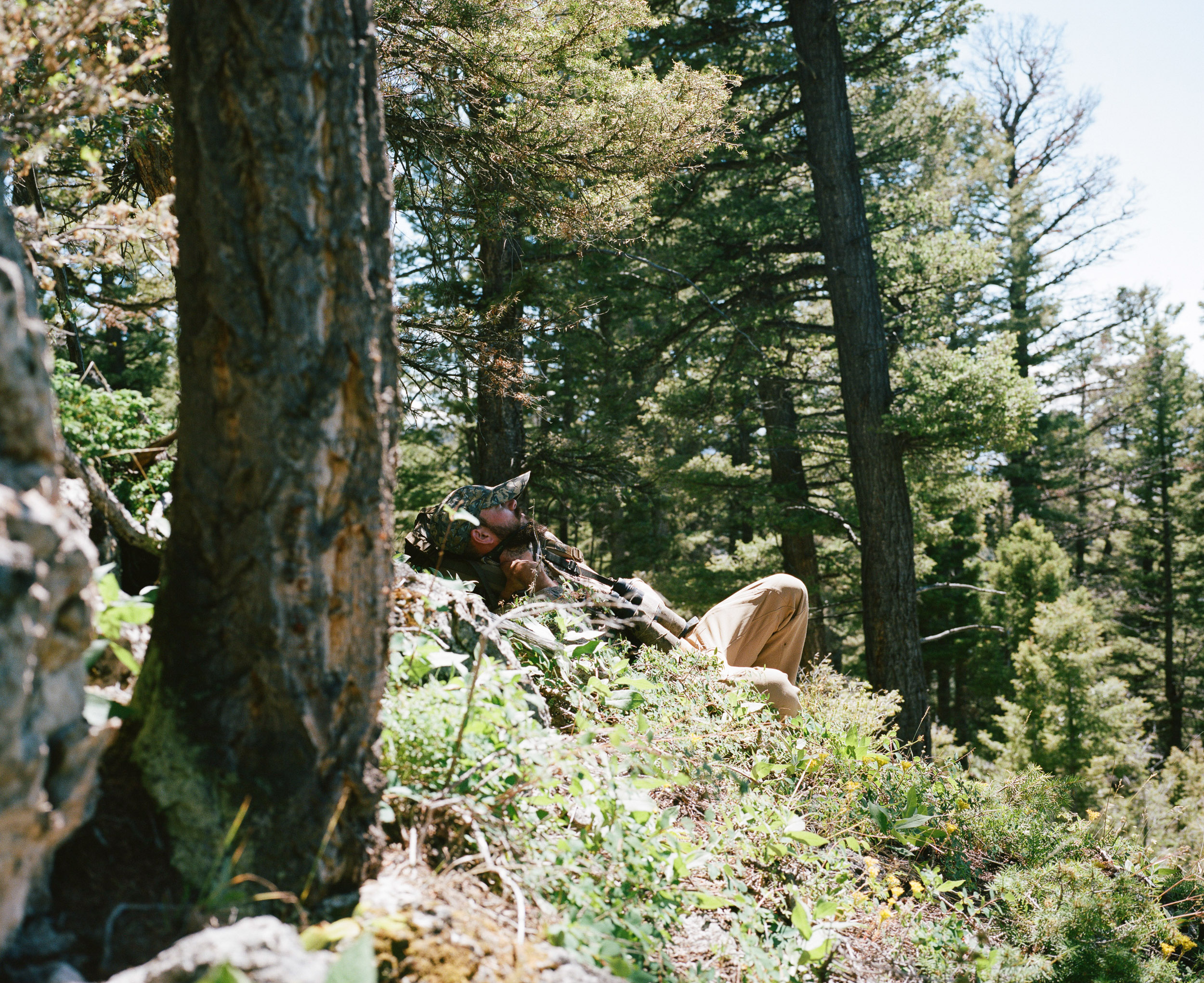 hunter/hiker napping in the woods