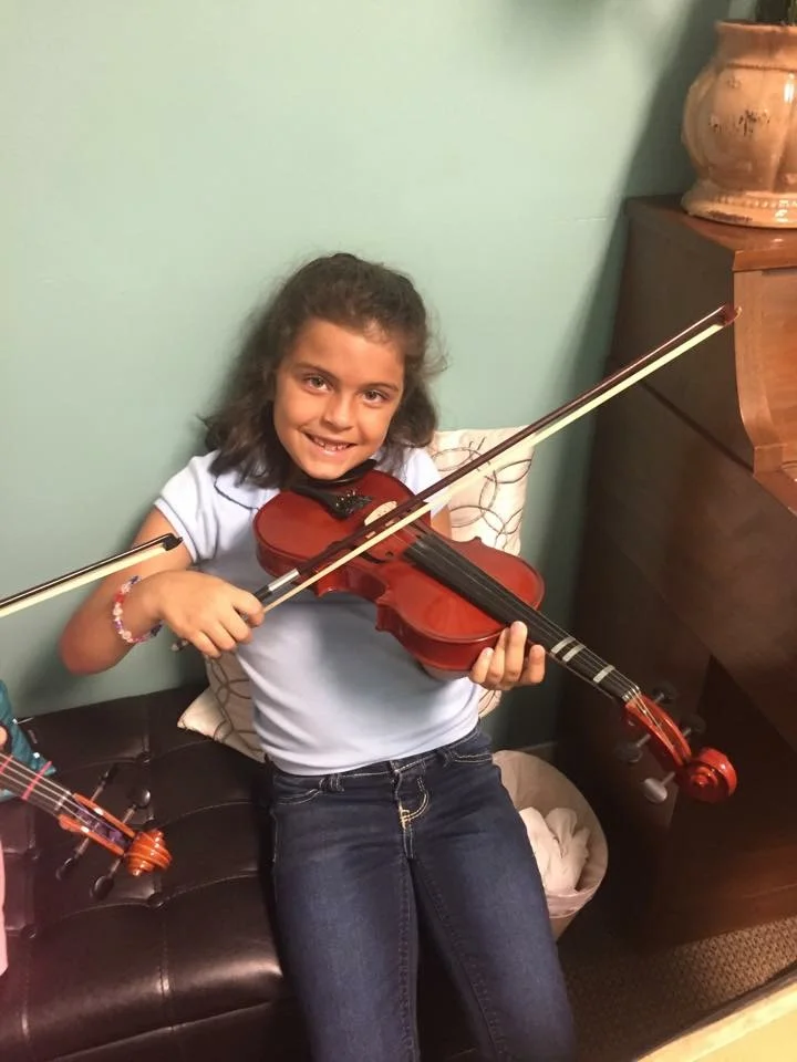Violin group consists of ;learning correct posture, technique, and bowing holds. we begin to read music and play on the open strings first.