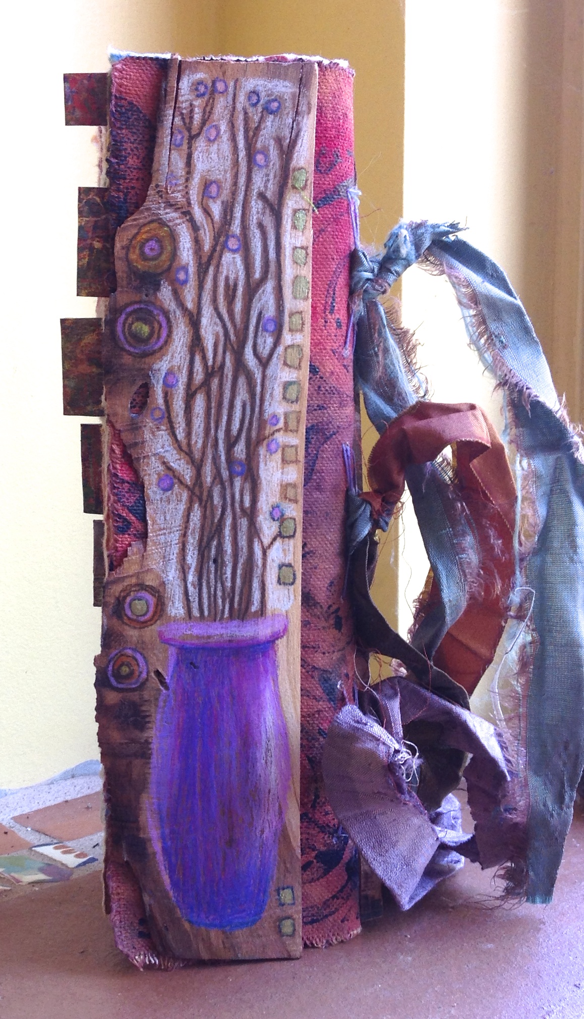 Planed and folded book wood, masa paper, canvas, color pencil, watercolor