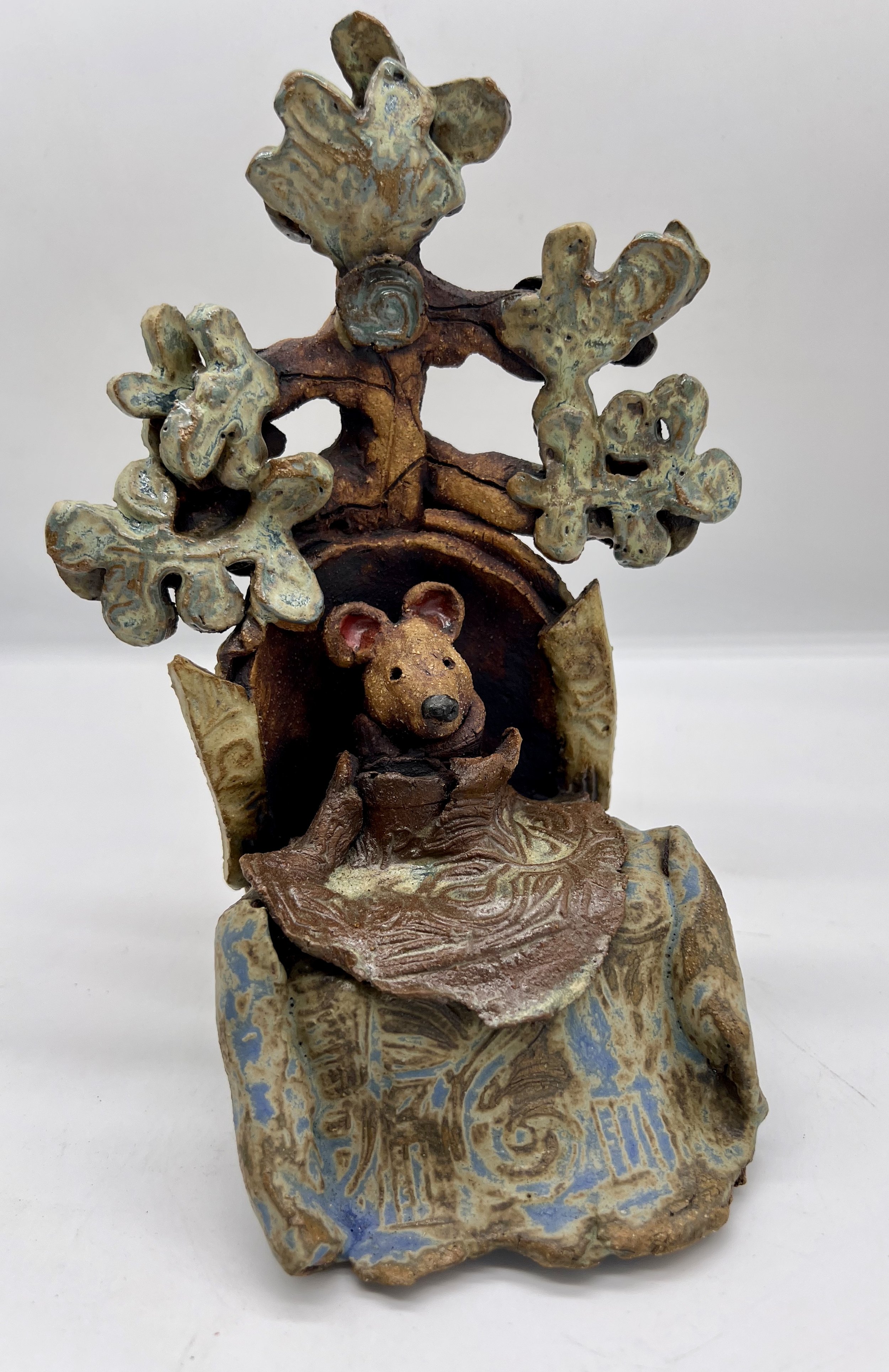 Engel. Ceramic Sculpture. 2025.The Sage Elders. These are the old ones with a comfort blanket and wheelchair. They are the Librarians of all Oak knowledge.