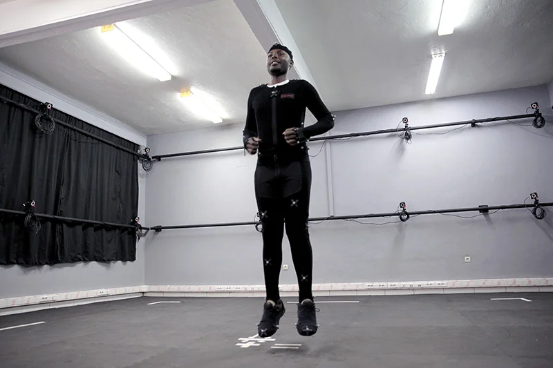 Patrick Salomon Ndaruhutse jumps while performing in ADMA's new motion capture studio in Kigali. Photos by Laura Elizabeth Pohl/ADMA