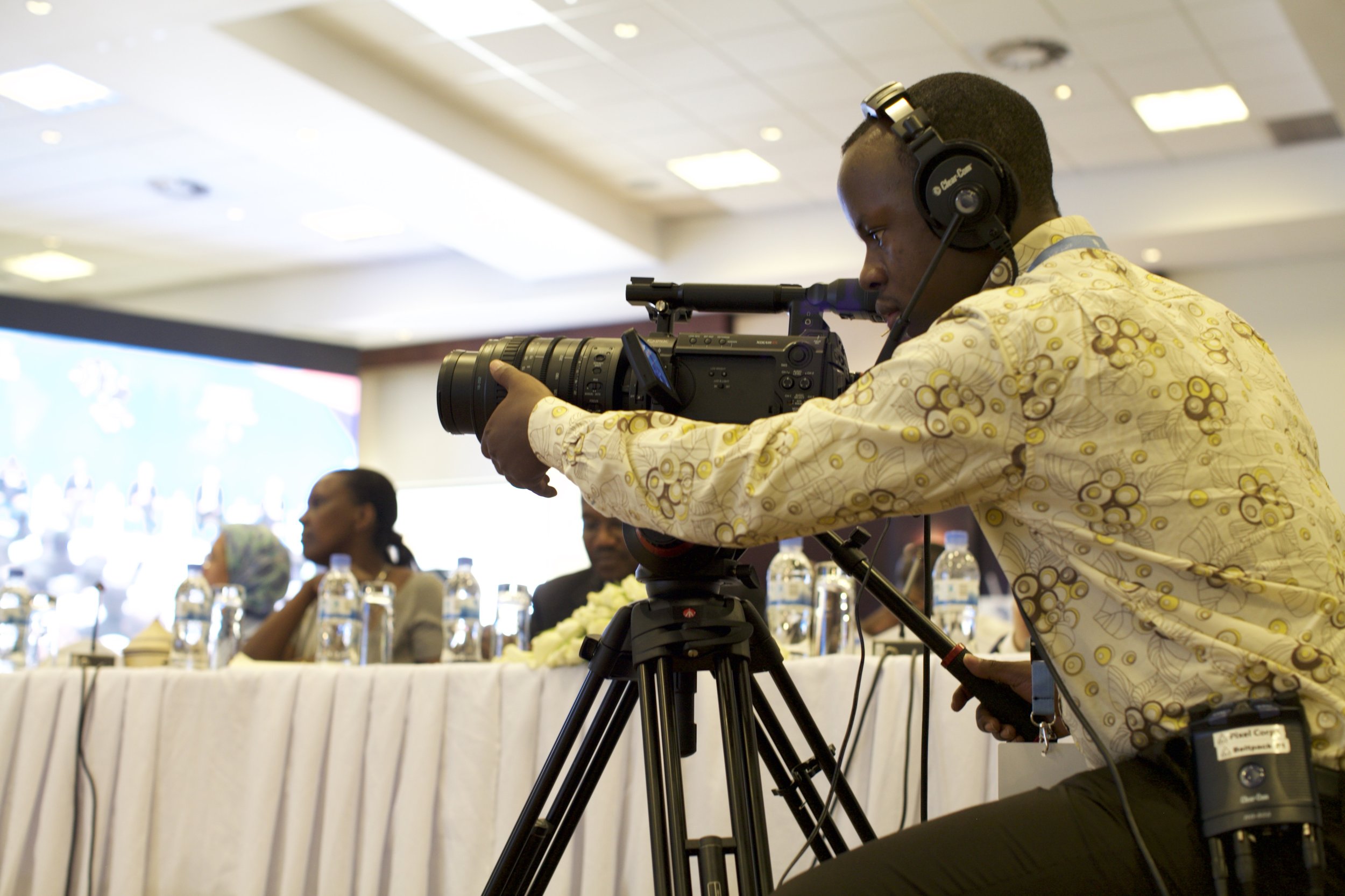 Blaise working the main camera for speaker closeups, a busy job all day