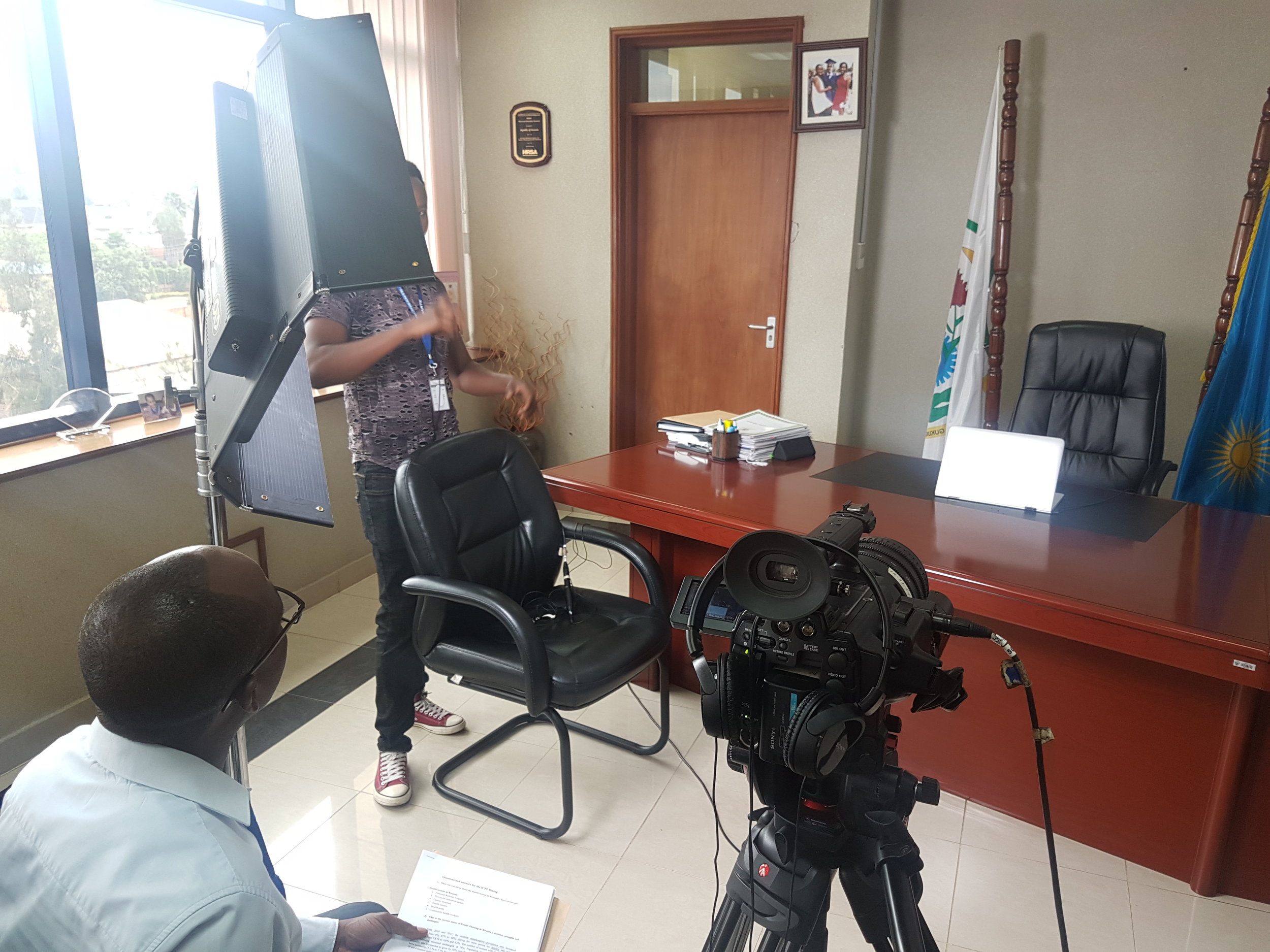 The Kino Flo Diva 401 light, Sony PMWF3, and student Hirwa Yves (behind the light) getting ready for the interview.