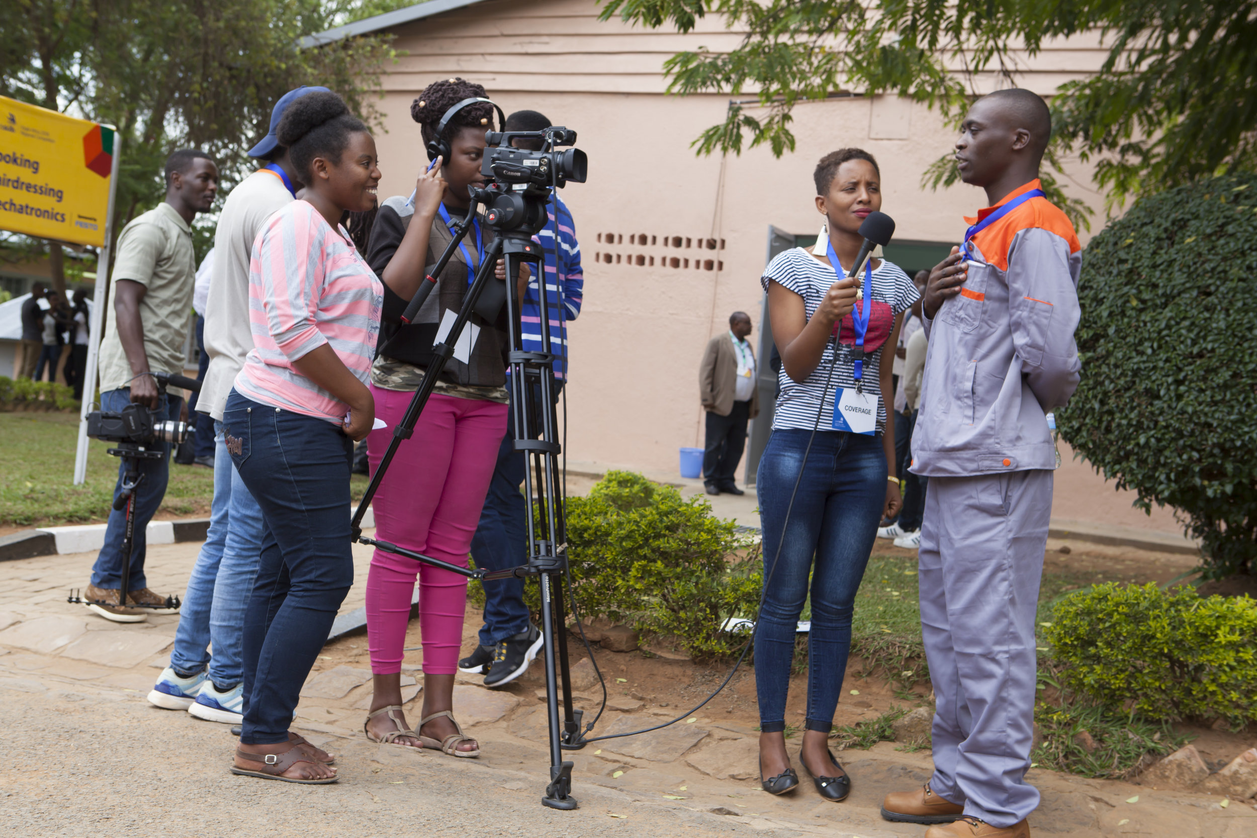 ADMA students Therese Mukundente, Sandrine Iragena, and Liliane Ikuze Filming at WorldSkills Competition at IPRC Kigali