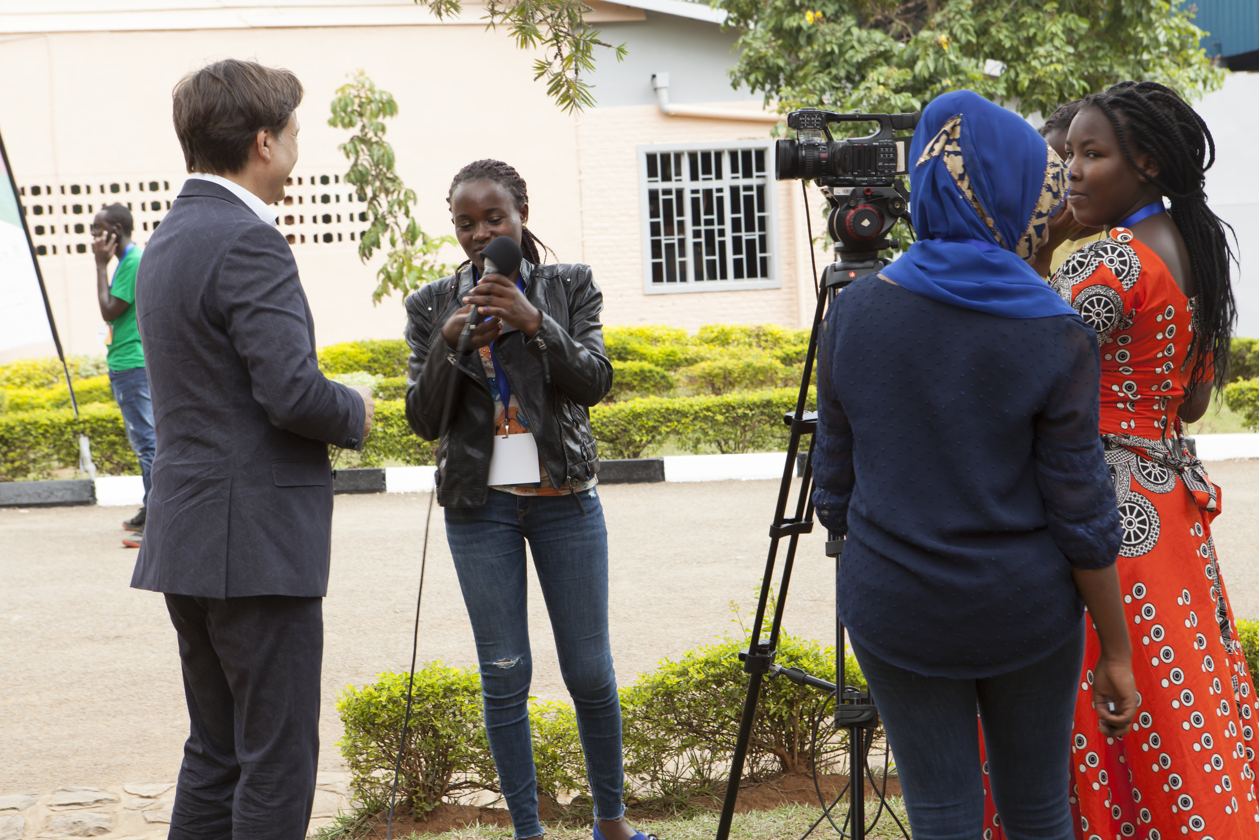 ADMA student Noella Claire Dushakimana sets up for an interview while her classmates look on during the WorldSkills competition at IPRC Kigali