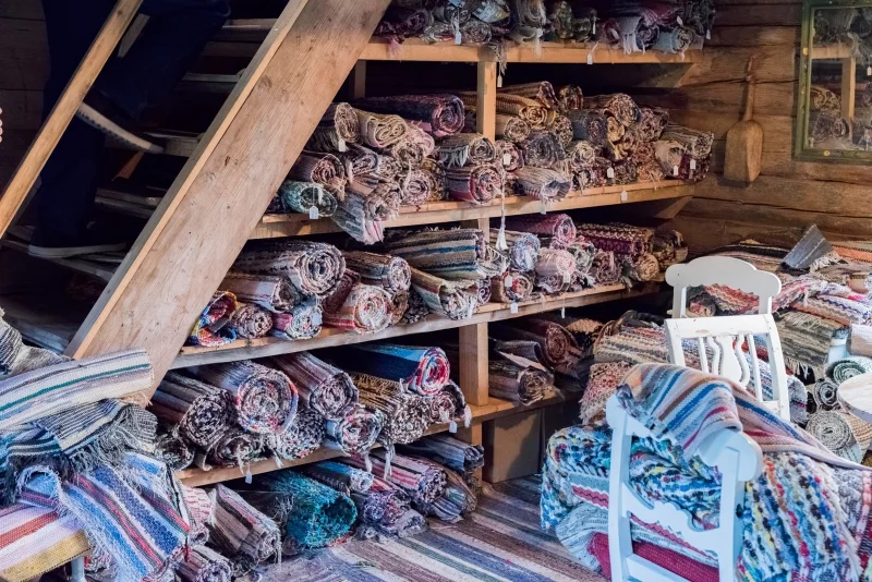 Just one section of rugs in an old Swedish building, newly found and freshly laundered, ready to be unrolled. If the rug speaks to us, it is added to the Scandinavian Made collection. We make three piles - one are rejected rugs, one pile represents conflicting emotions which we will return to one by one and resolve and one pile holds the clear winners. Each rug's design can only be seen once the rug is unrolled - an arduous but necessary step as we work through hundreds of rugs!