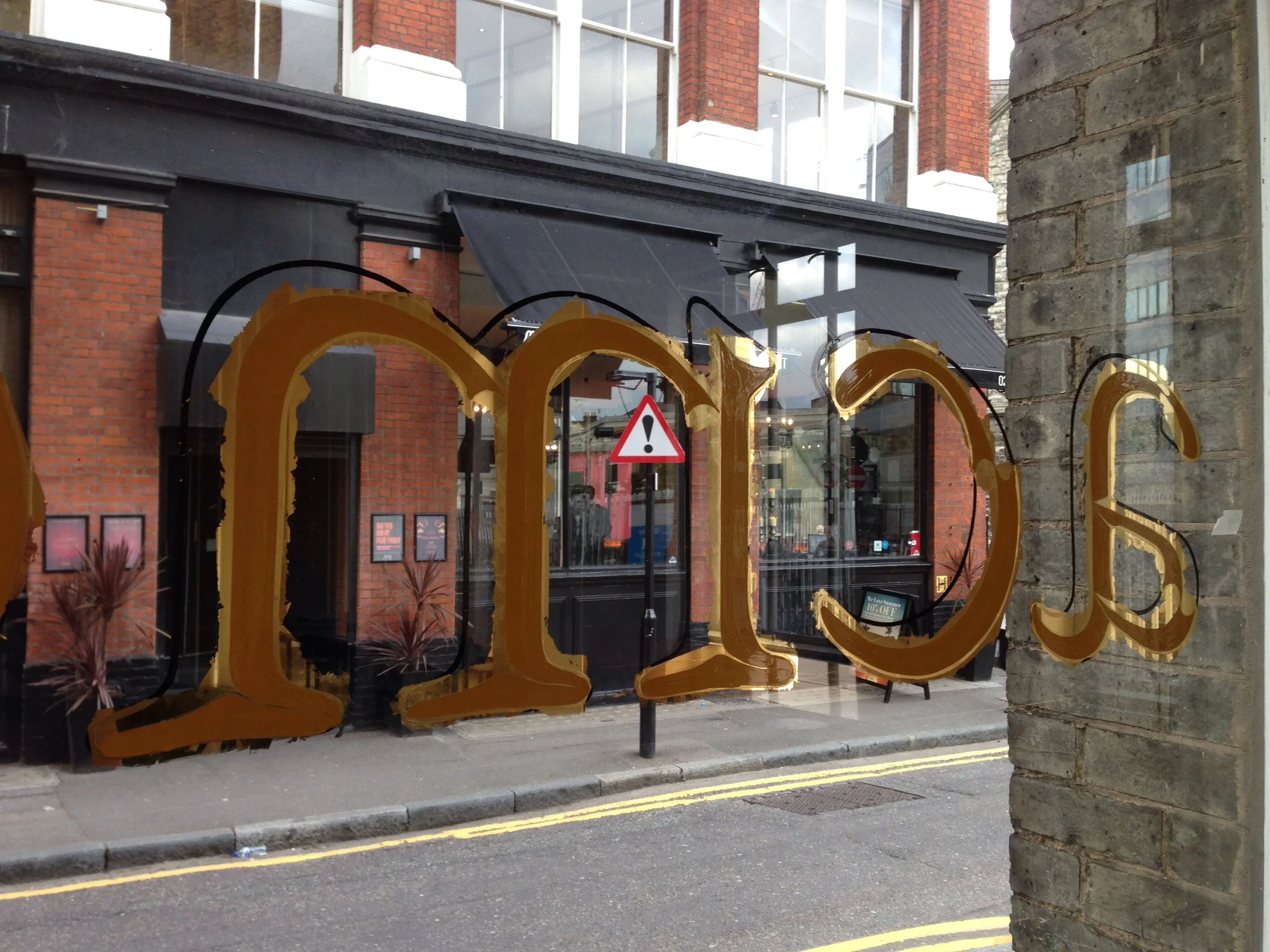 Once the gold has dried and been burnished to a mirror finish it is backed up using enamel paint.