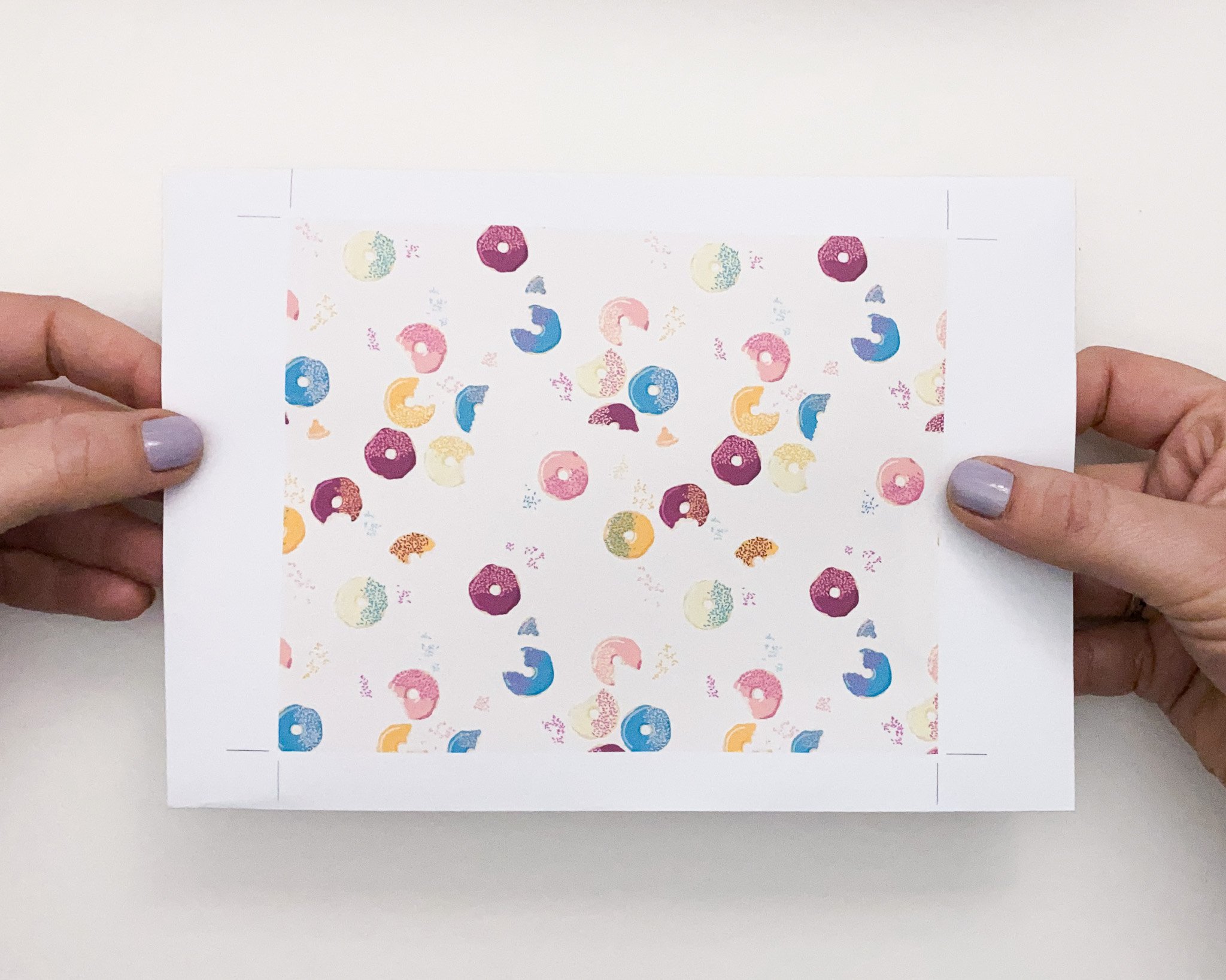 repeat pattern sample with doughnut motif in pastel tones made in illustrator for surface pattern design applications