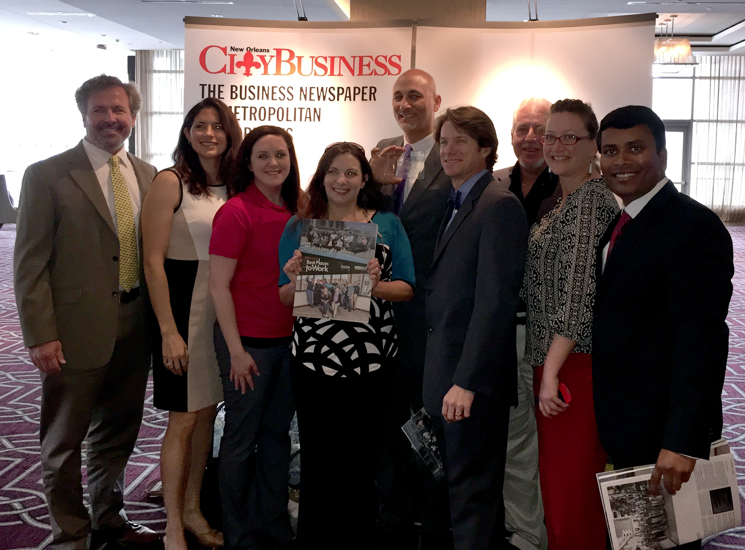  Infinity Engineering Consultants employees, from left, Michael Riviere, Rachel Kenney, Cindy Gallo, Amber Cardon, Raoul V. Chauvin, III, Bill Thomassie, Kevin Loze, Katie Carter and Vinay&nbsp;Ramesh attend the New Orleans City Business Best Places 