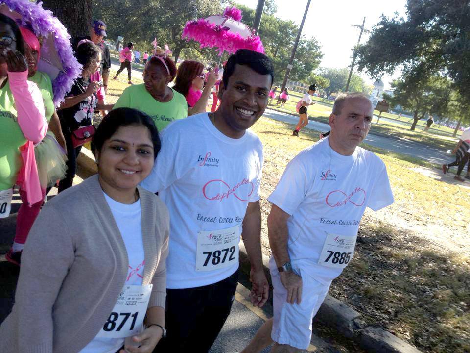  Infinity Race for the Cure team members, from left, Sushmeetha Annam, Vinay Ramesh and Mike Laux take part in the 5K walk on October 25.&nbsp; 