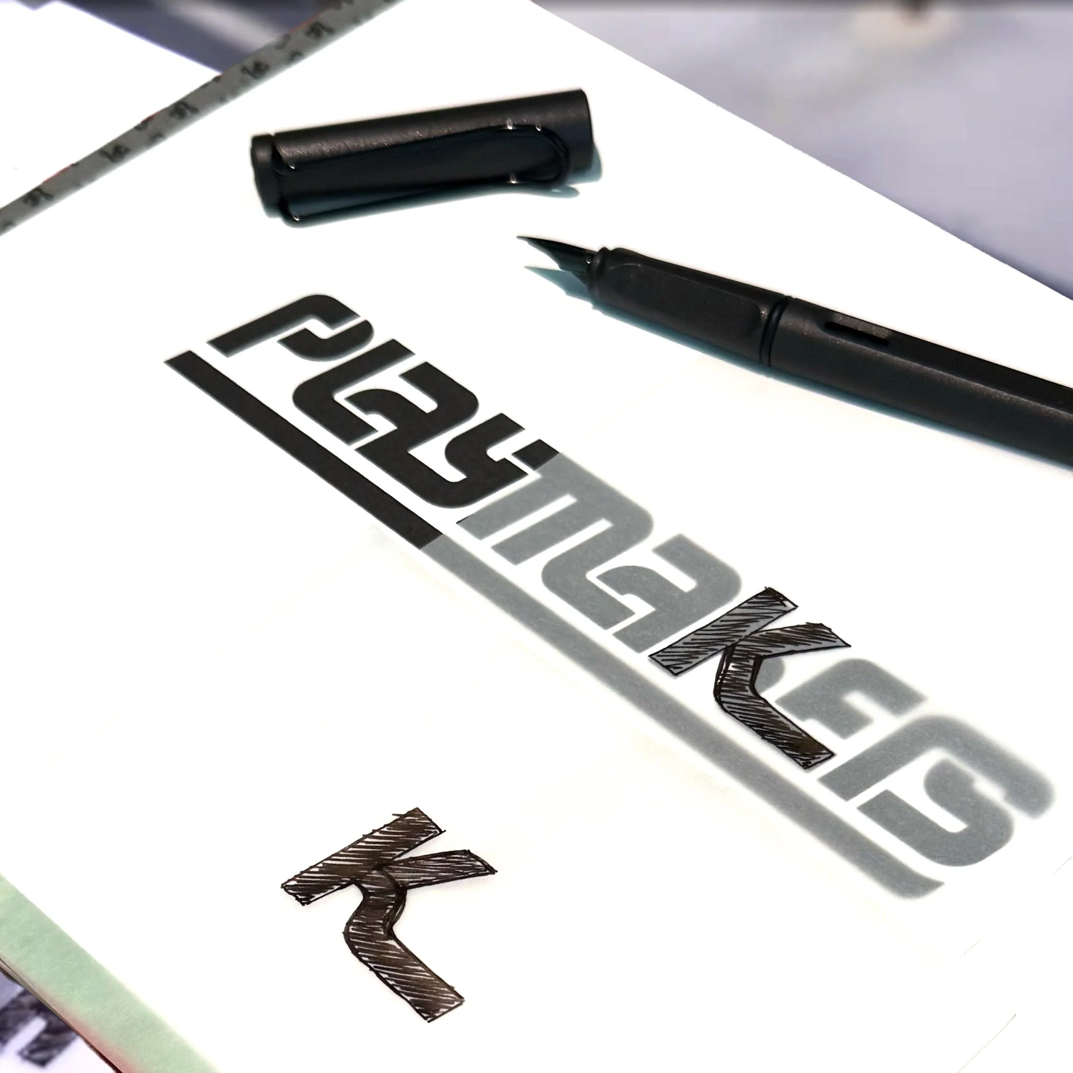 PLAYMAKERS logo sketches presented