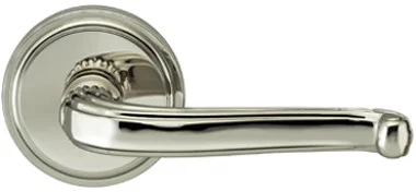165193-00-US14 Traditions Lined curve lever round rose, shown in polished nickel. Available in all functions and five finishes.