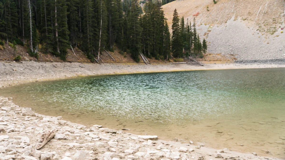 There's very little distortion from the water. You can see the rocks below the surface in great detail from far away.