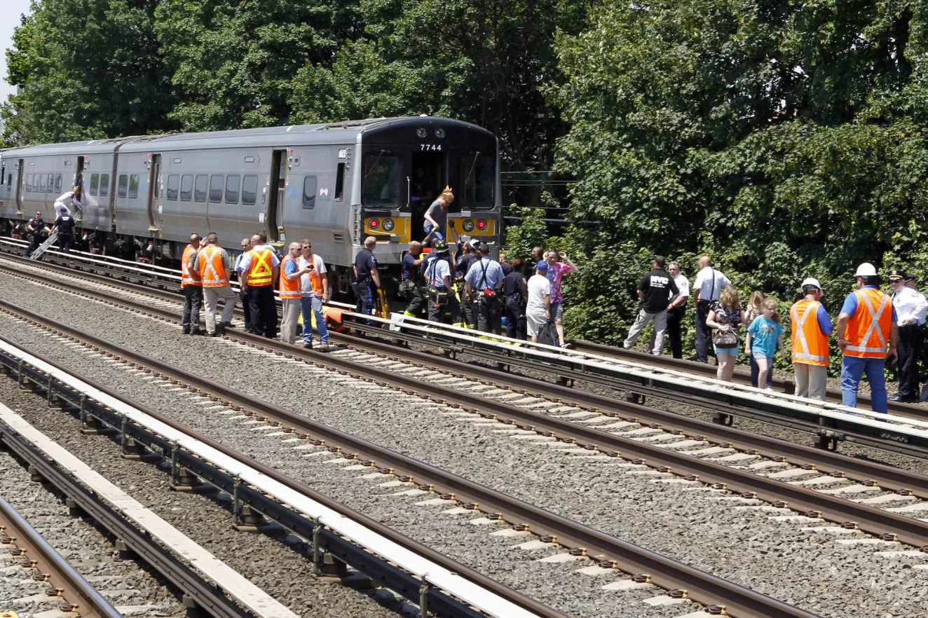 Photo credit: G.N. Miller. This is the train car Emily and I had to exit from. Emily was evacuated through the rear door on the left, and I had to come down the "ladder-stairs" in the rear of the car.