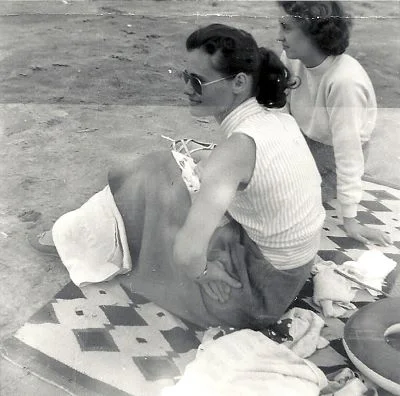 Grandma at the beach. I love her sunglasses.