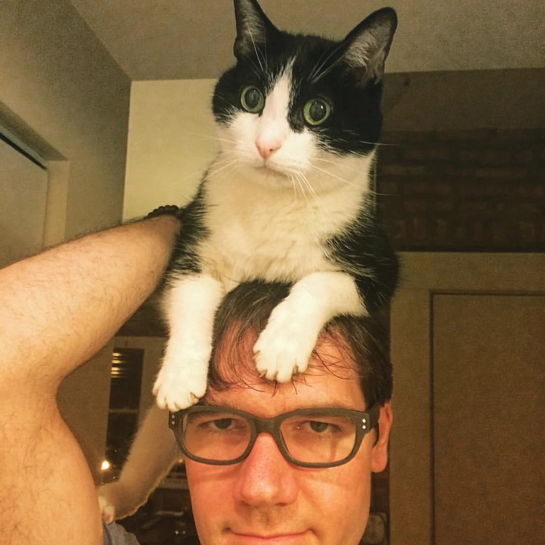 Jake’s a very good sport. Notice how he is avoiding clawing Dean’s head.