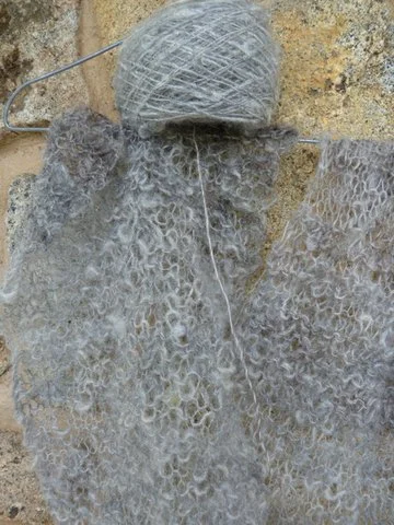 Grey Gotland yarn and knitting.JPG