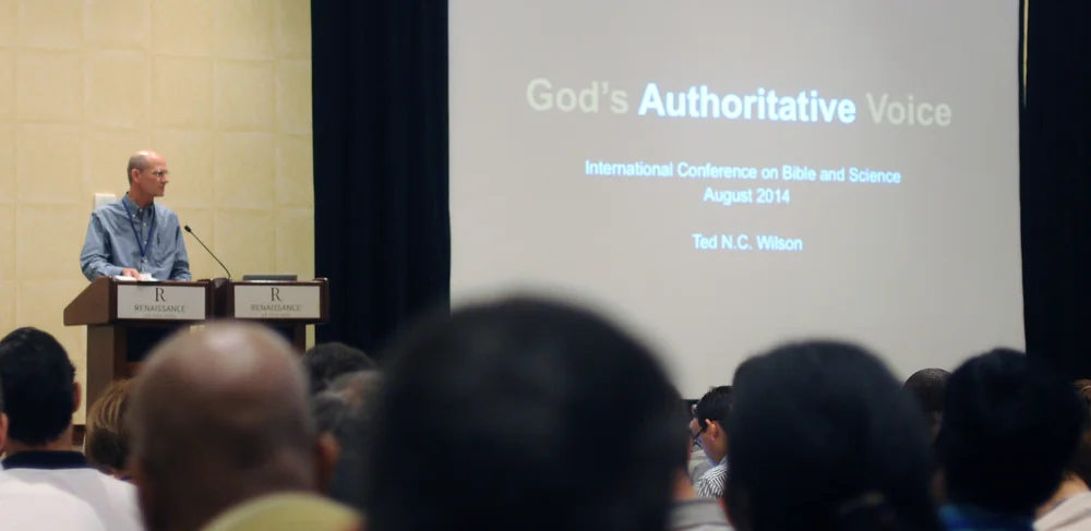 Adventist Church President Ted N. C. Wilson speaks on the stage of the Bible and science conference in Las Vegas, Nevada, on Friday, August 15. Photo: Blackmer