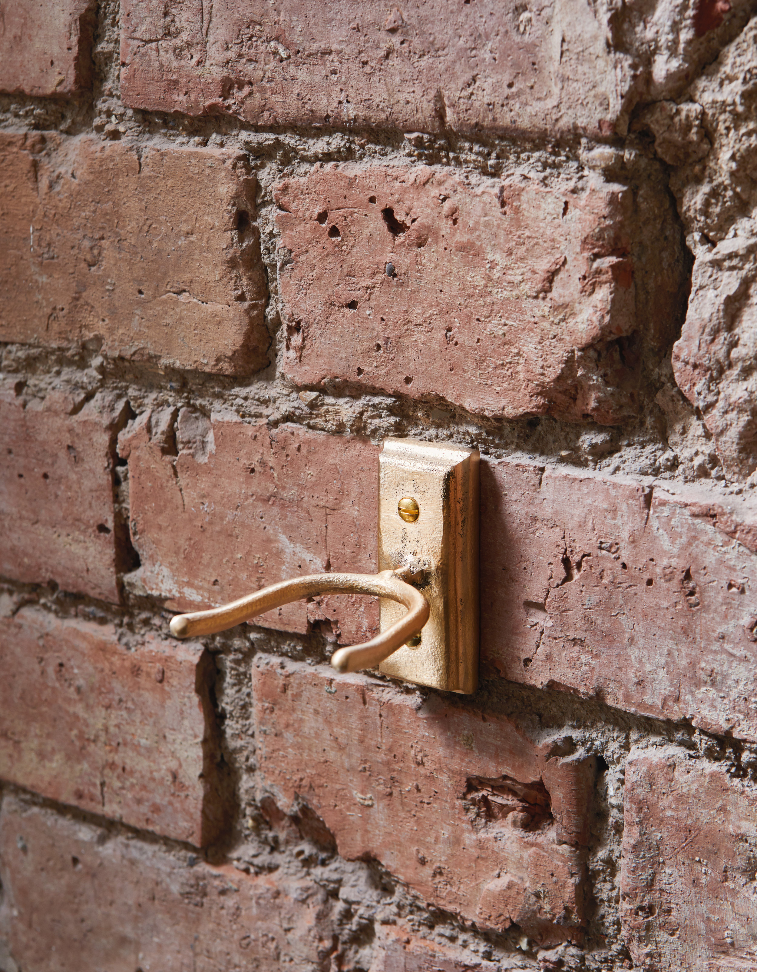 Bronze broom hook
