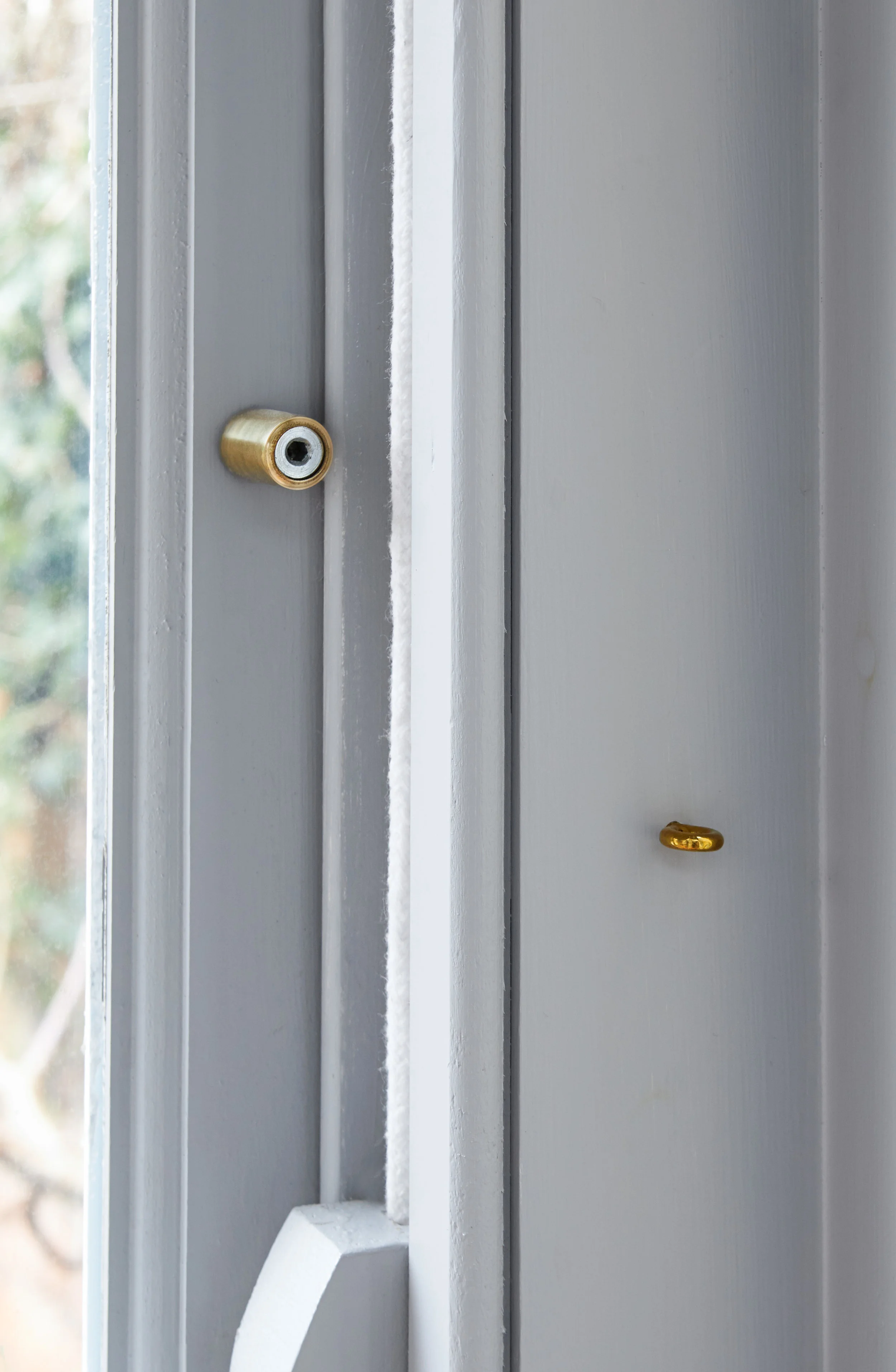 Solid brass screw eye for hanging window lock key