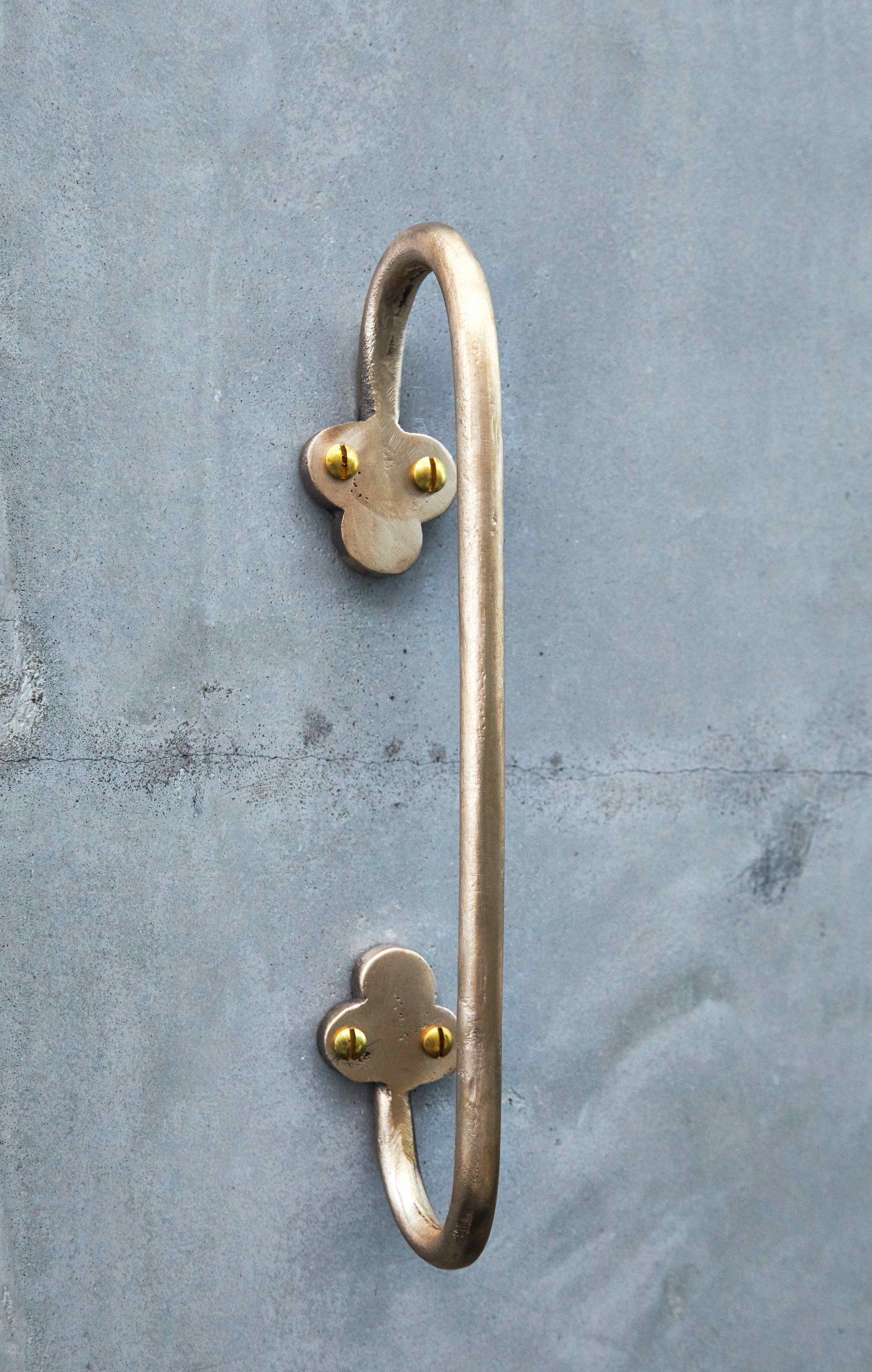 Cast bronze shower handrail