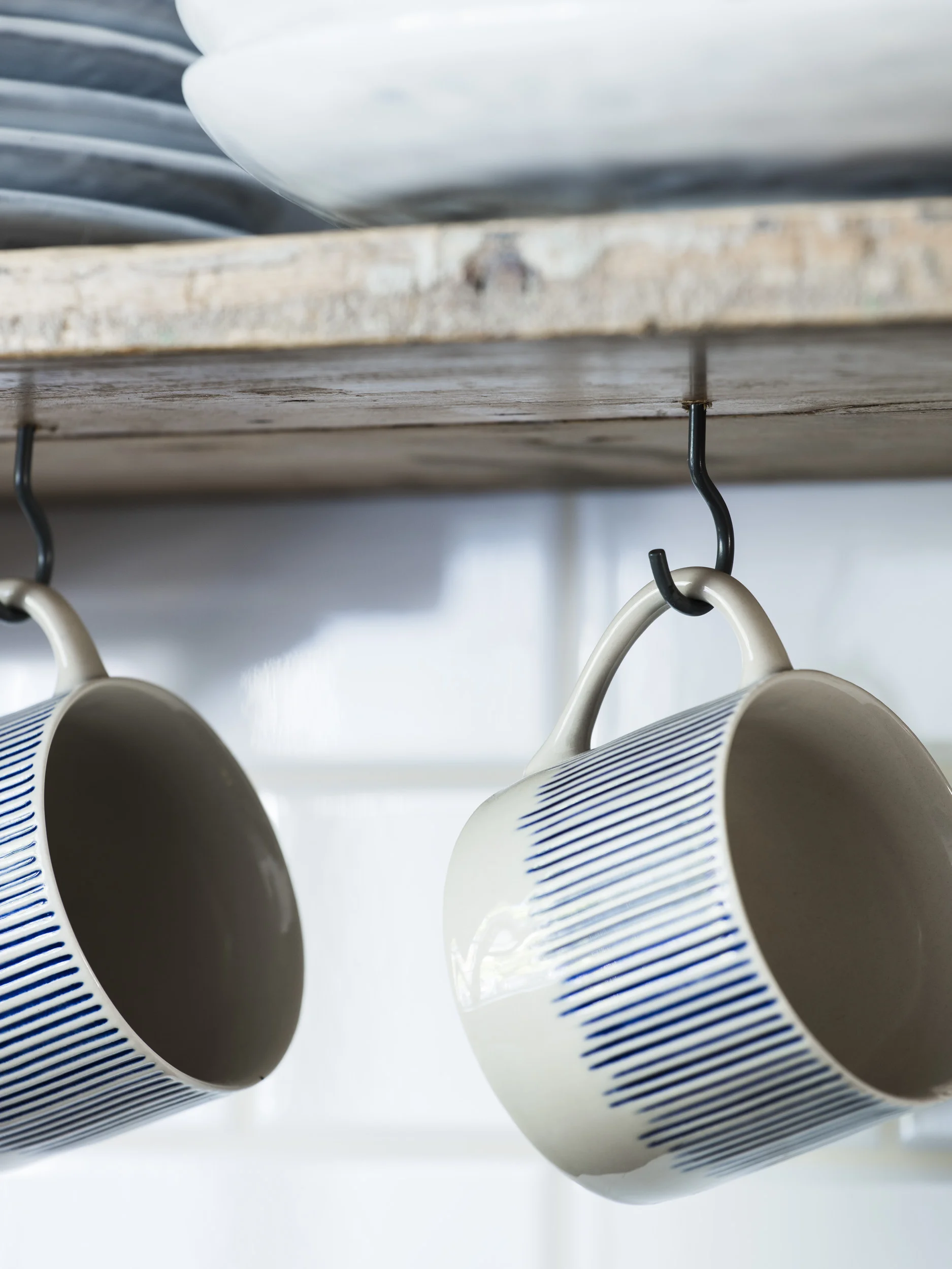 Small grey screw hook for mug storage