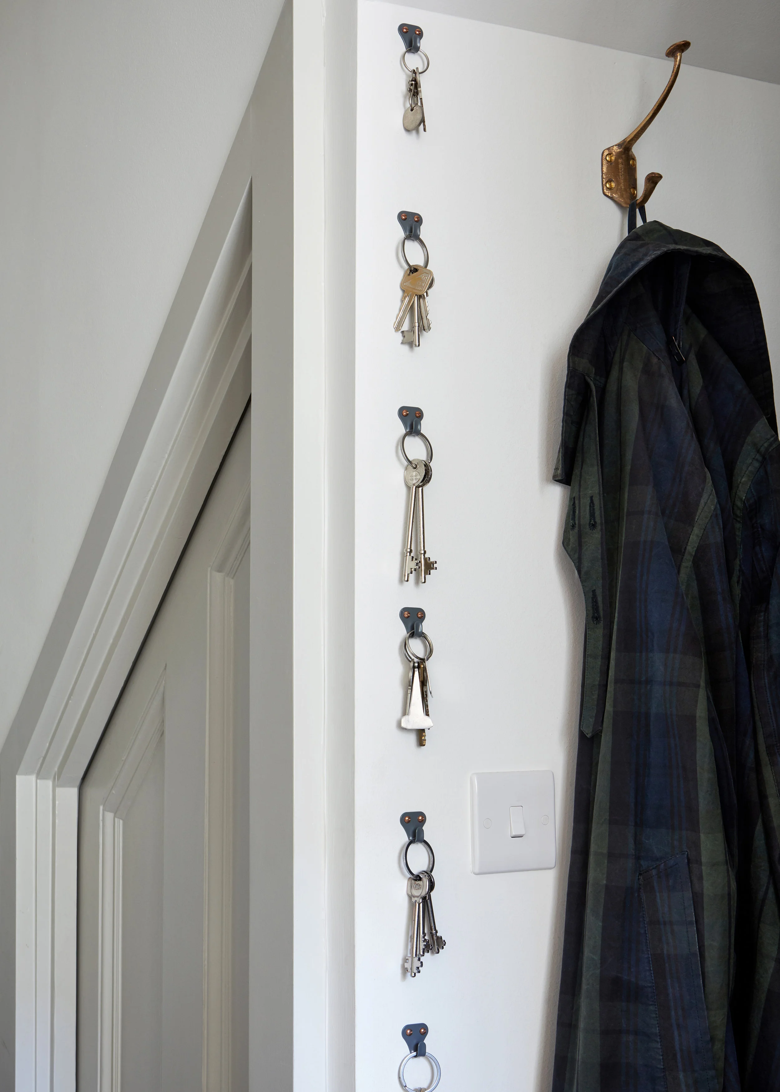 Small grey hook for hanging keys