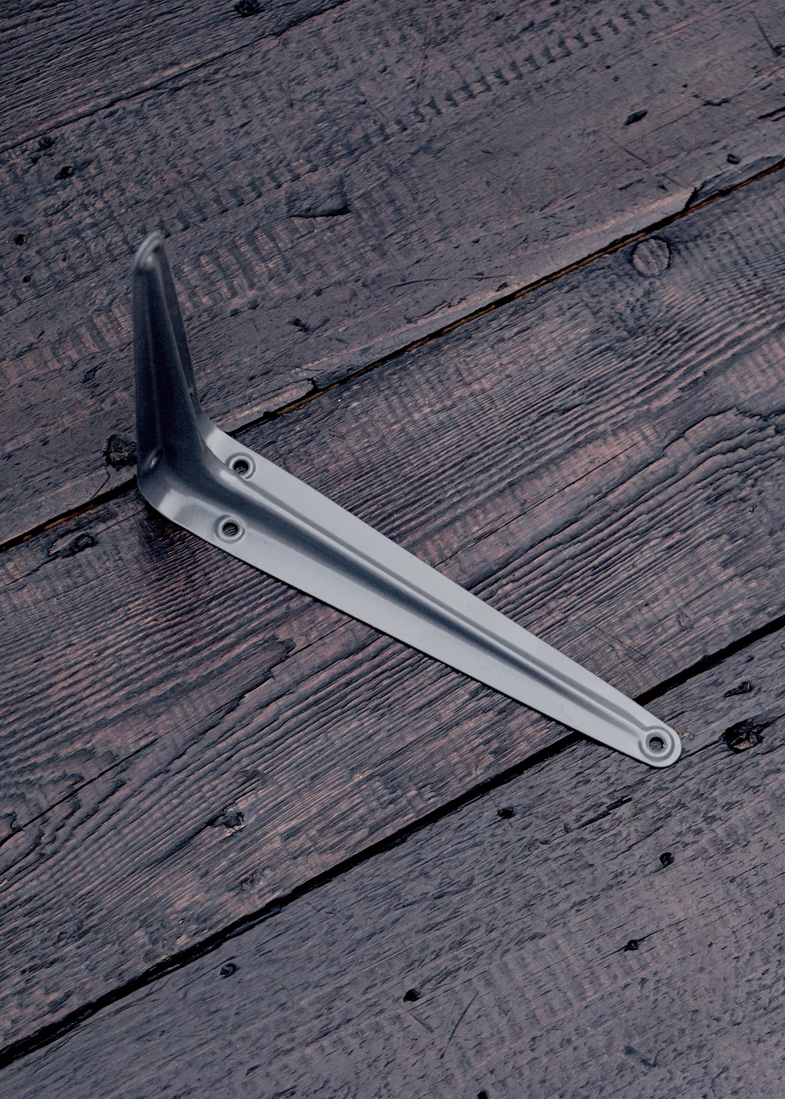 Grey metal shelf bracket
