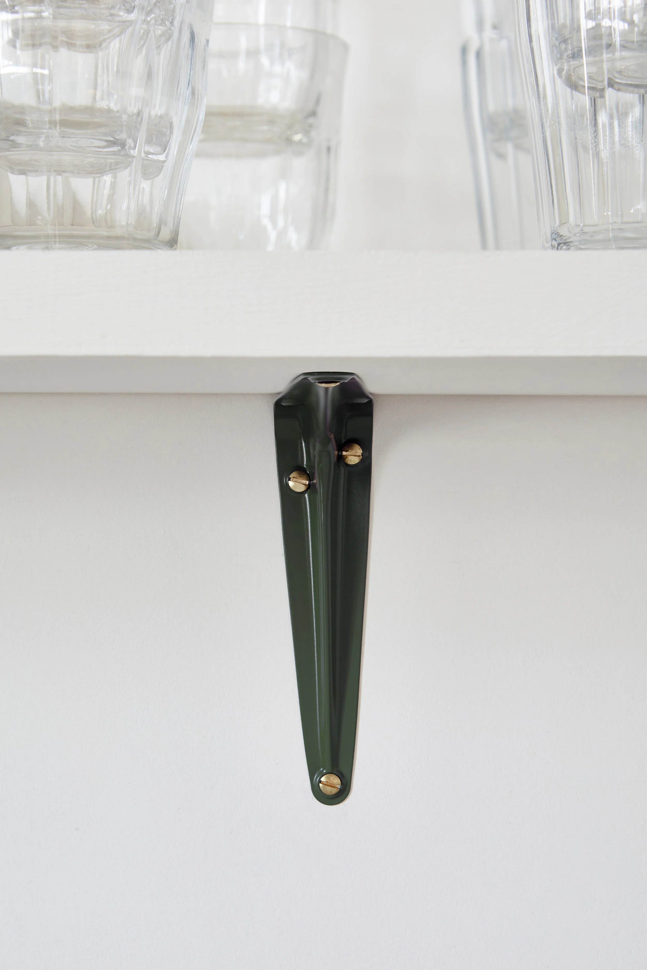 Green metal shelf bracket
