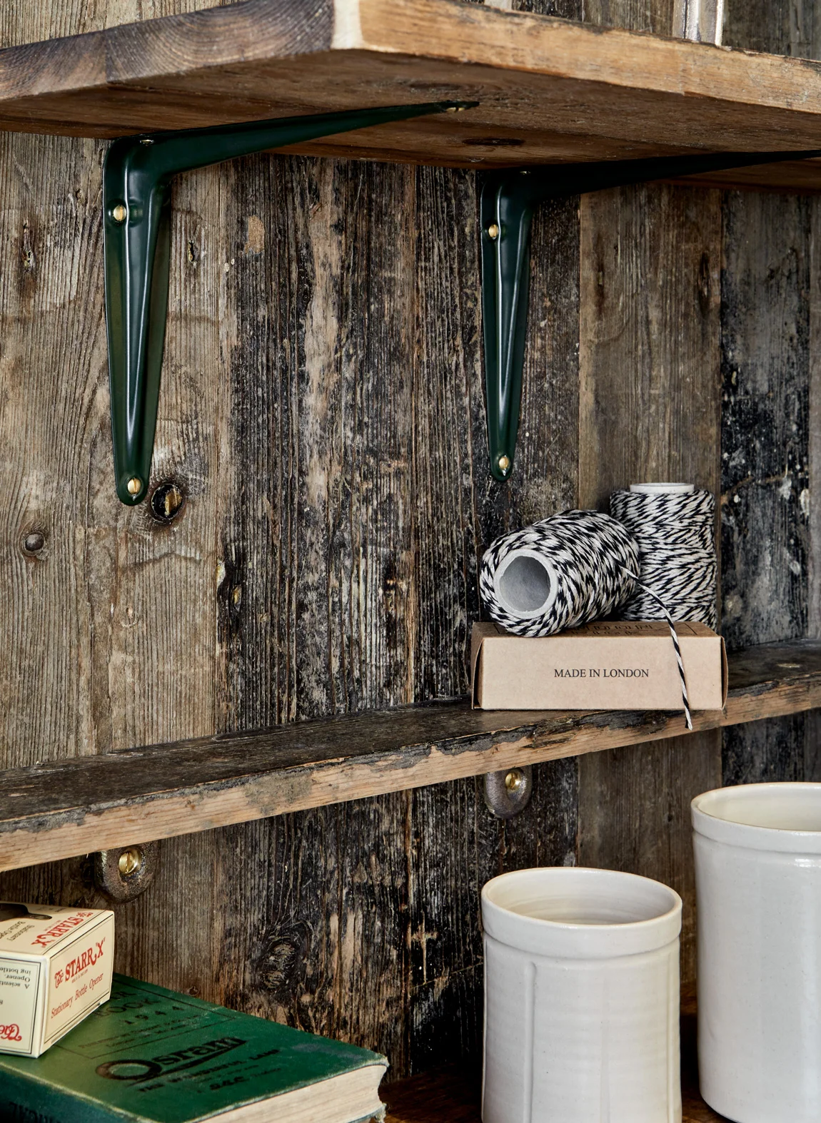 green metal shelf brackets