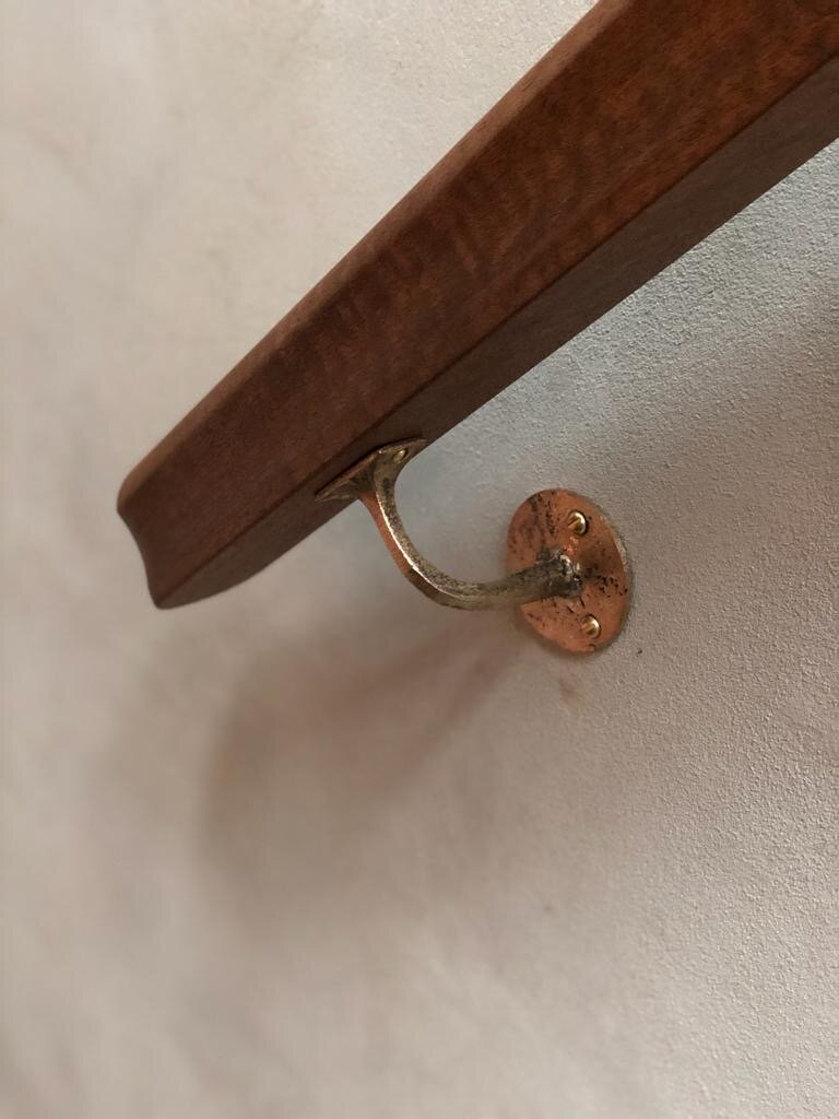 cast bronze stair handrail wall bracket