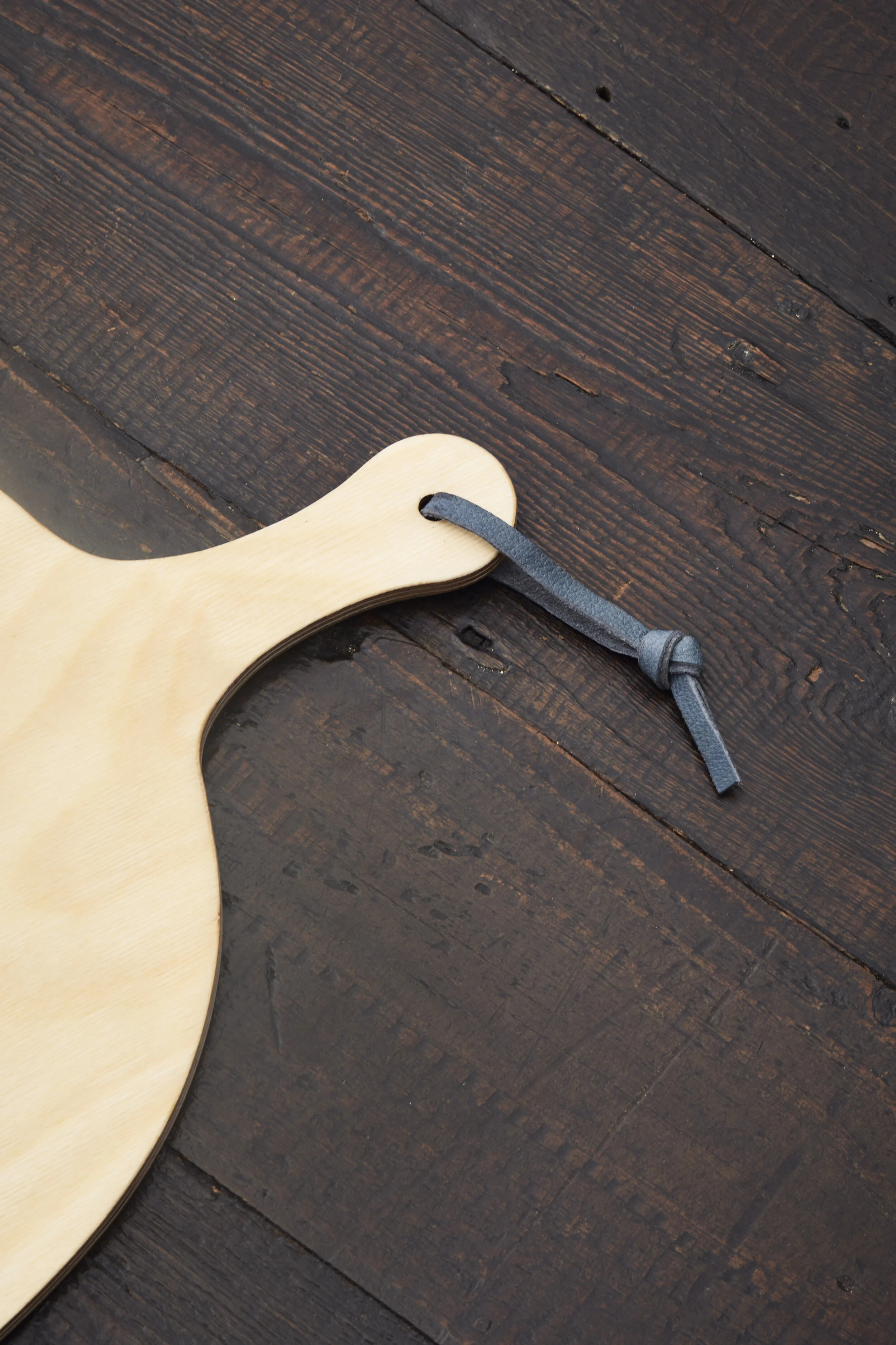 wooden chopping board with handle