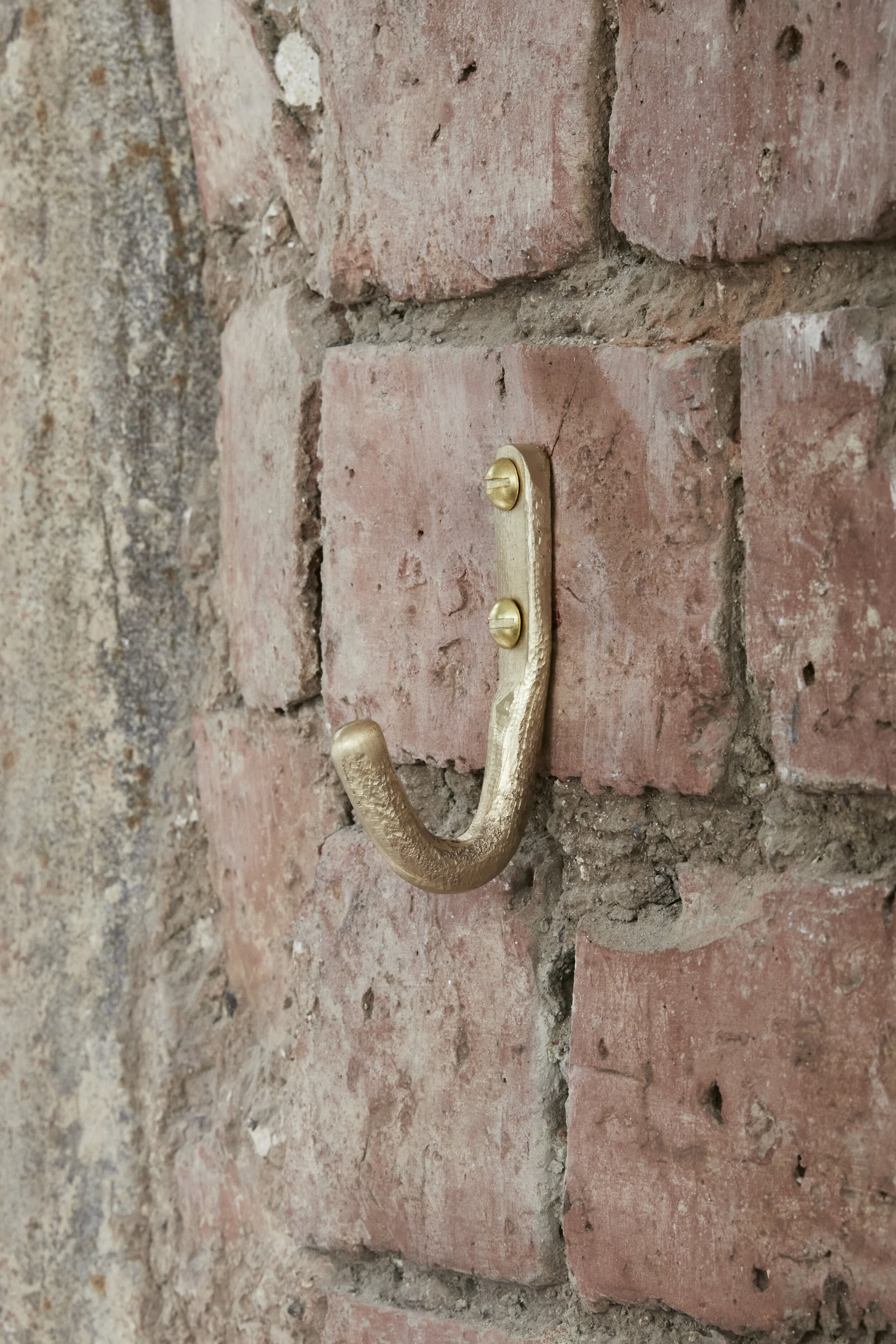 Solid bronze pan hook for kitchen storage