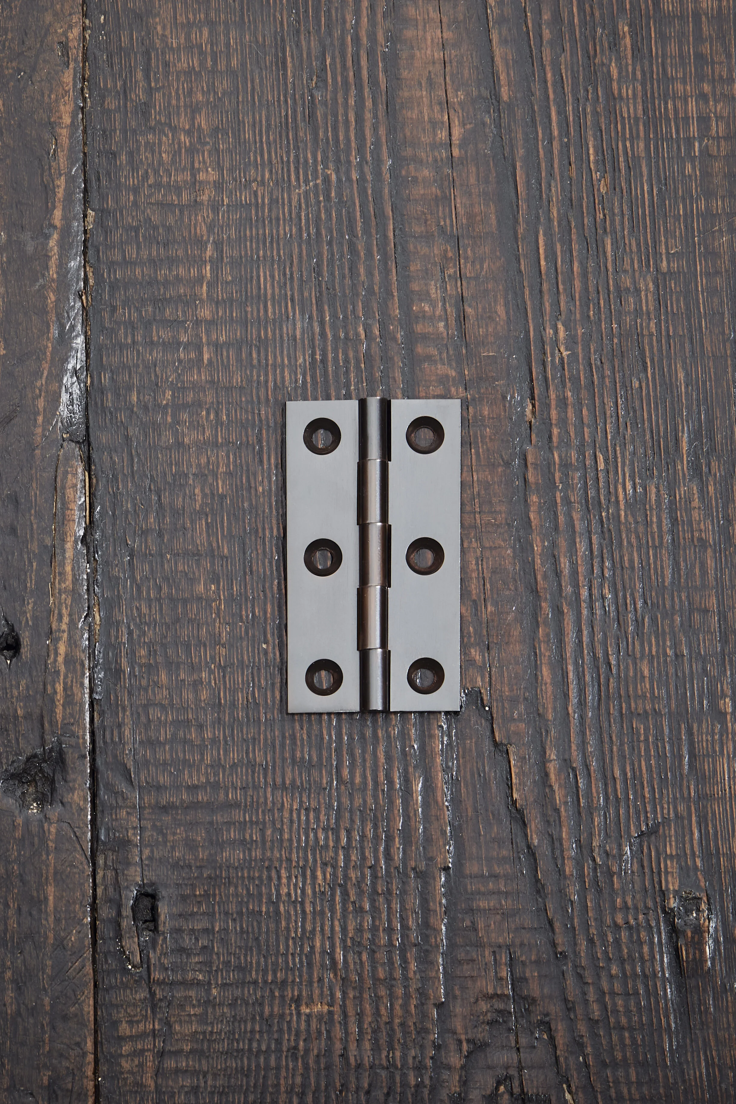 Aged bronze cabinet hinge