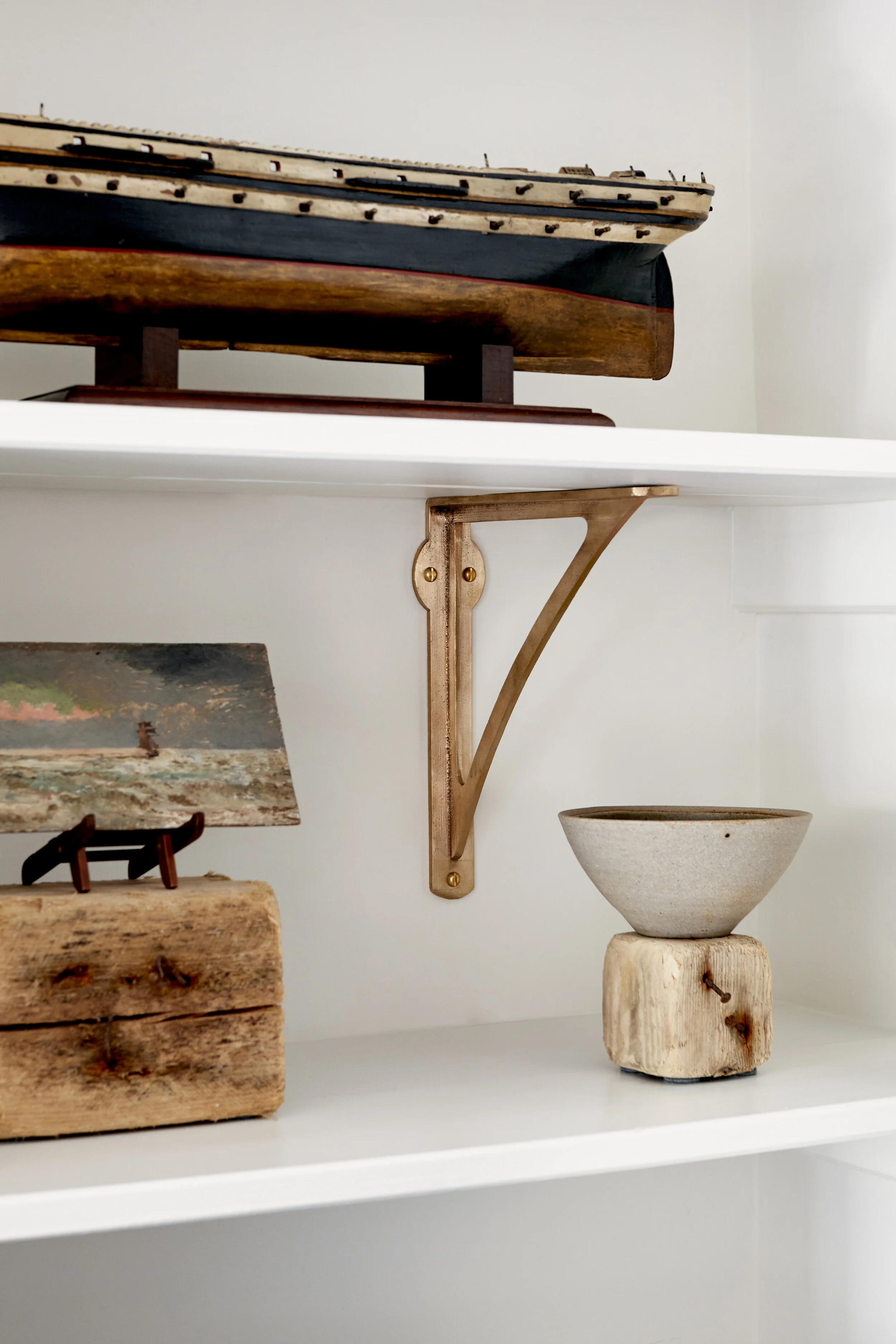 Cast bronze strong boy shelf bracket