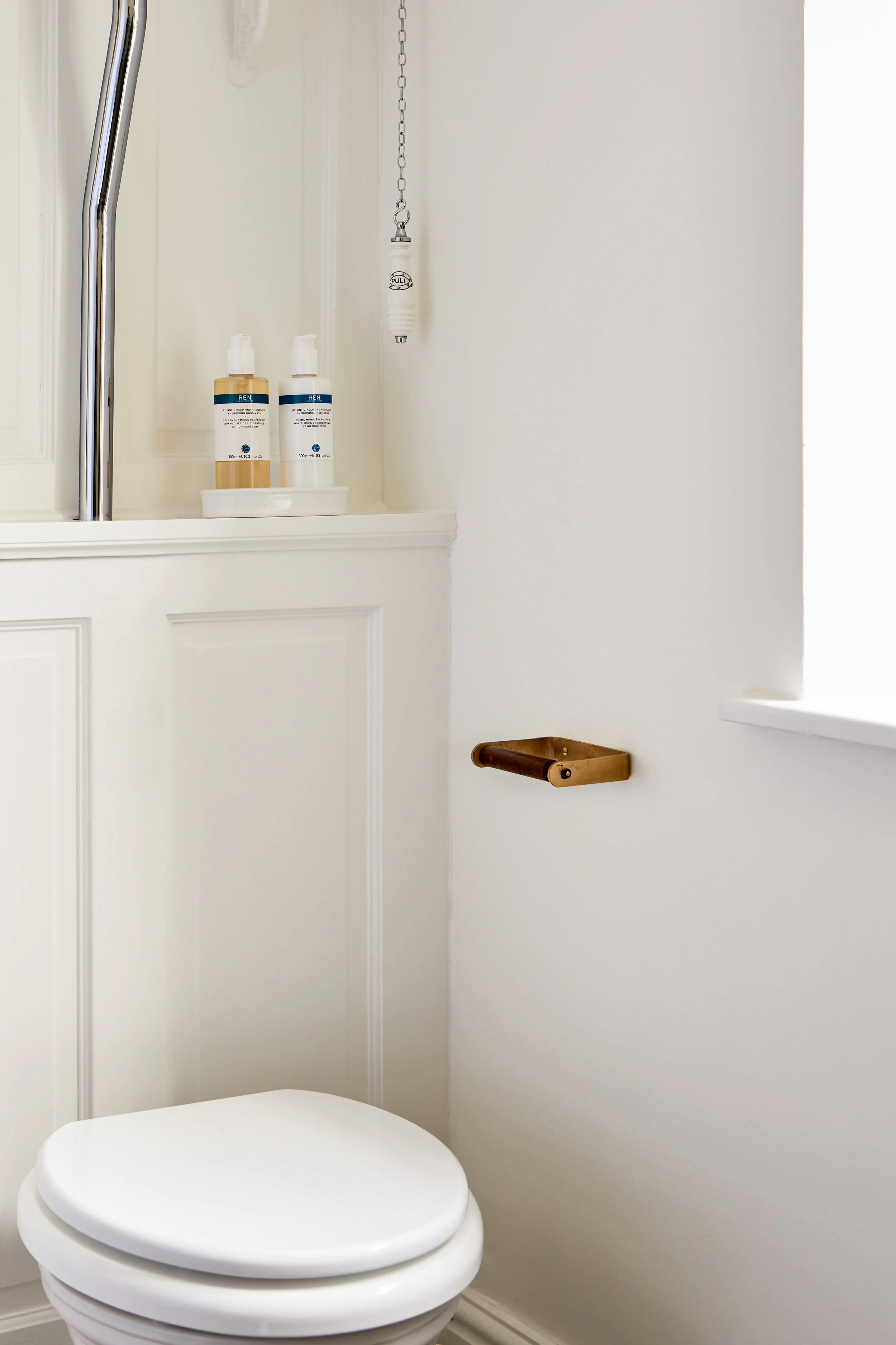 Cast Bronze and wooden toilet roll holder