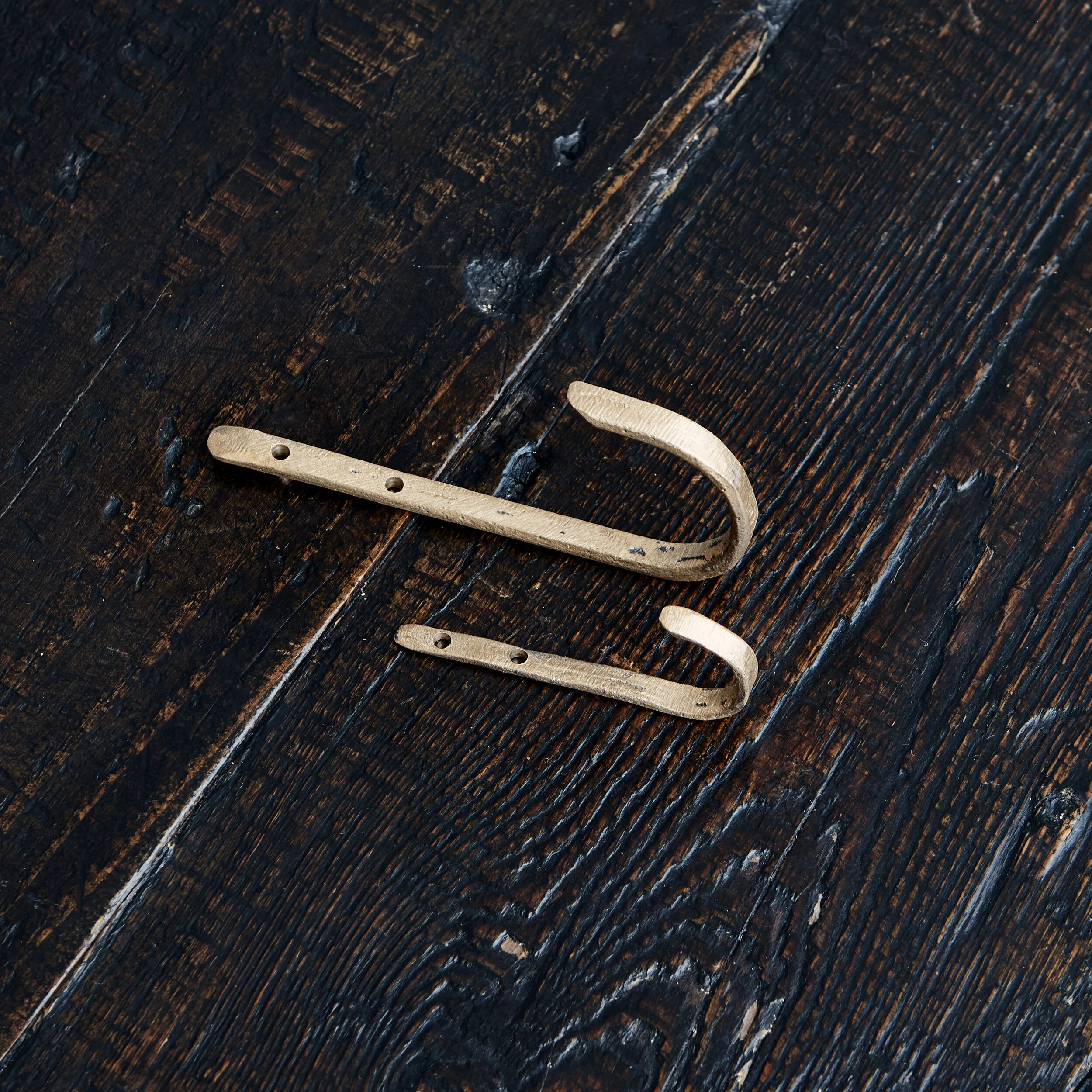 bronze hook for utensil storage