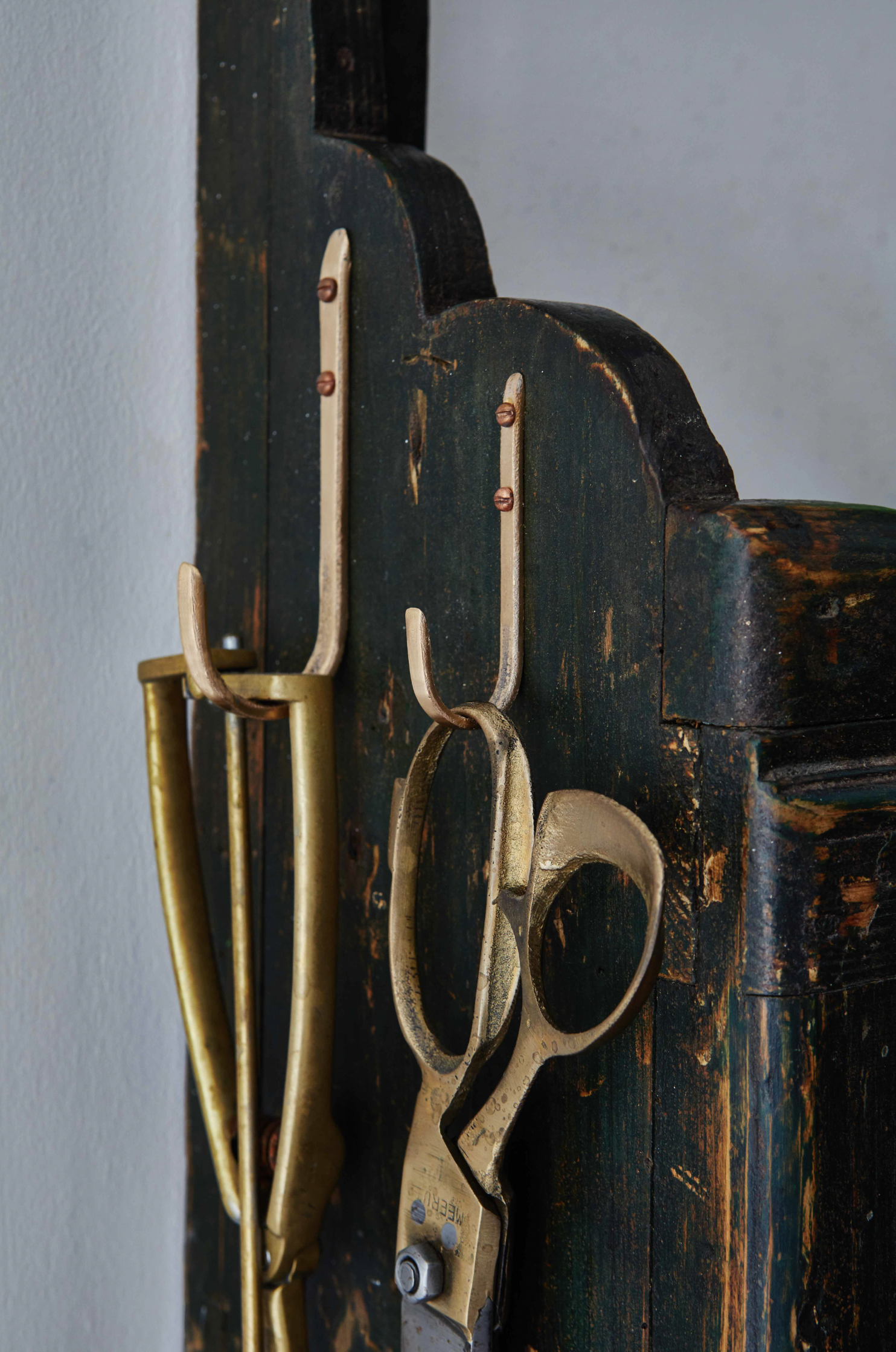 Cast bronze small hook for utensils