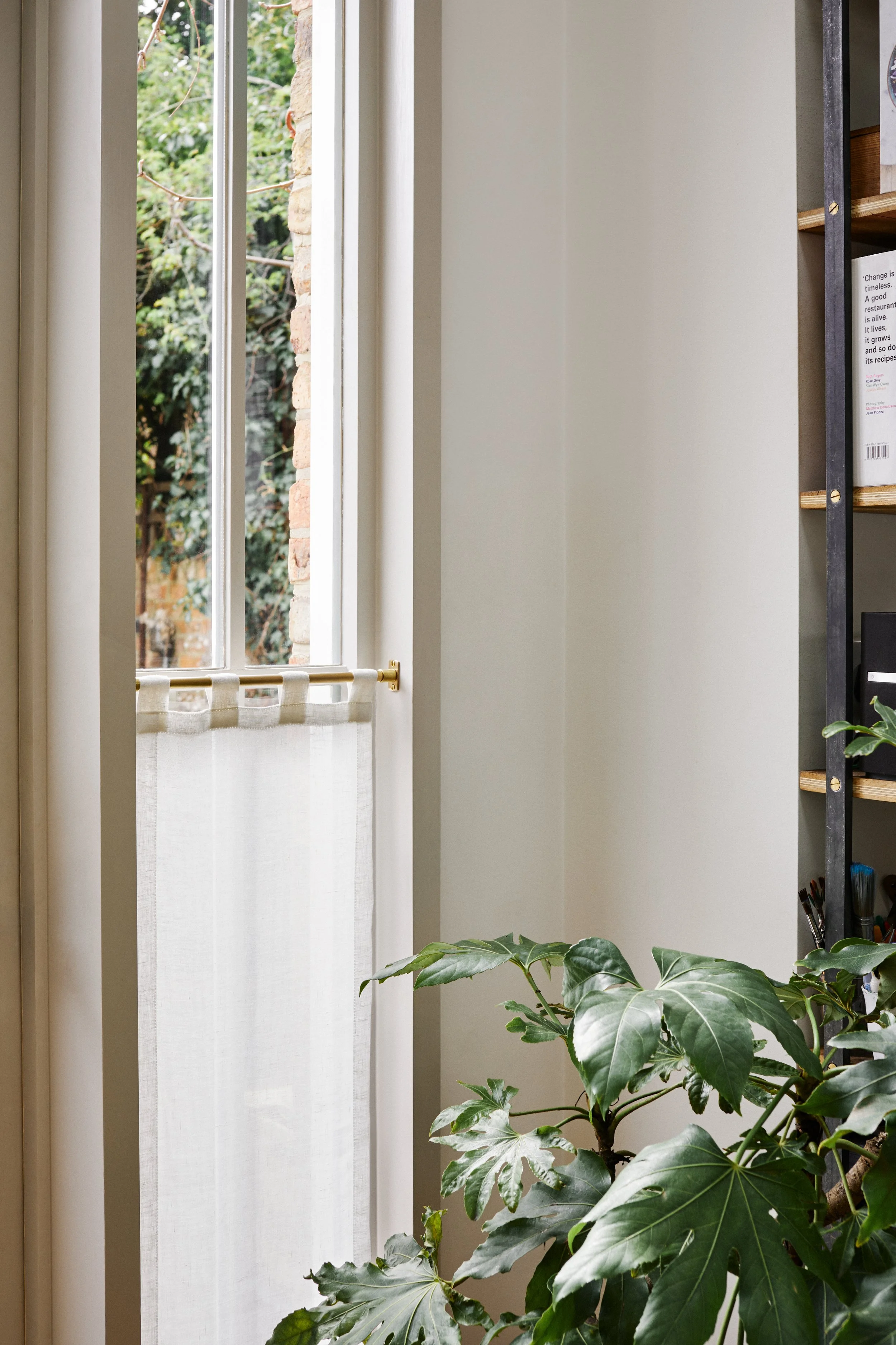 ChatGPT said: Unlacquered Brass Café Curtain Rail Set with Recessed Brackets wider shot of linen curtain fitted halfway up narrow 38cm wide kitchen window frame.