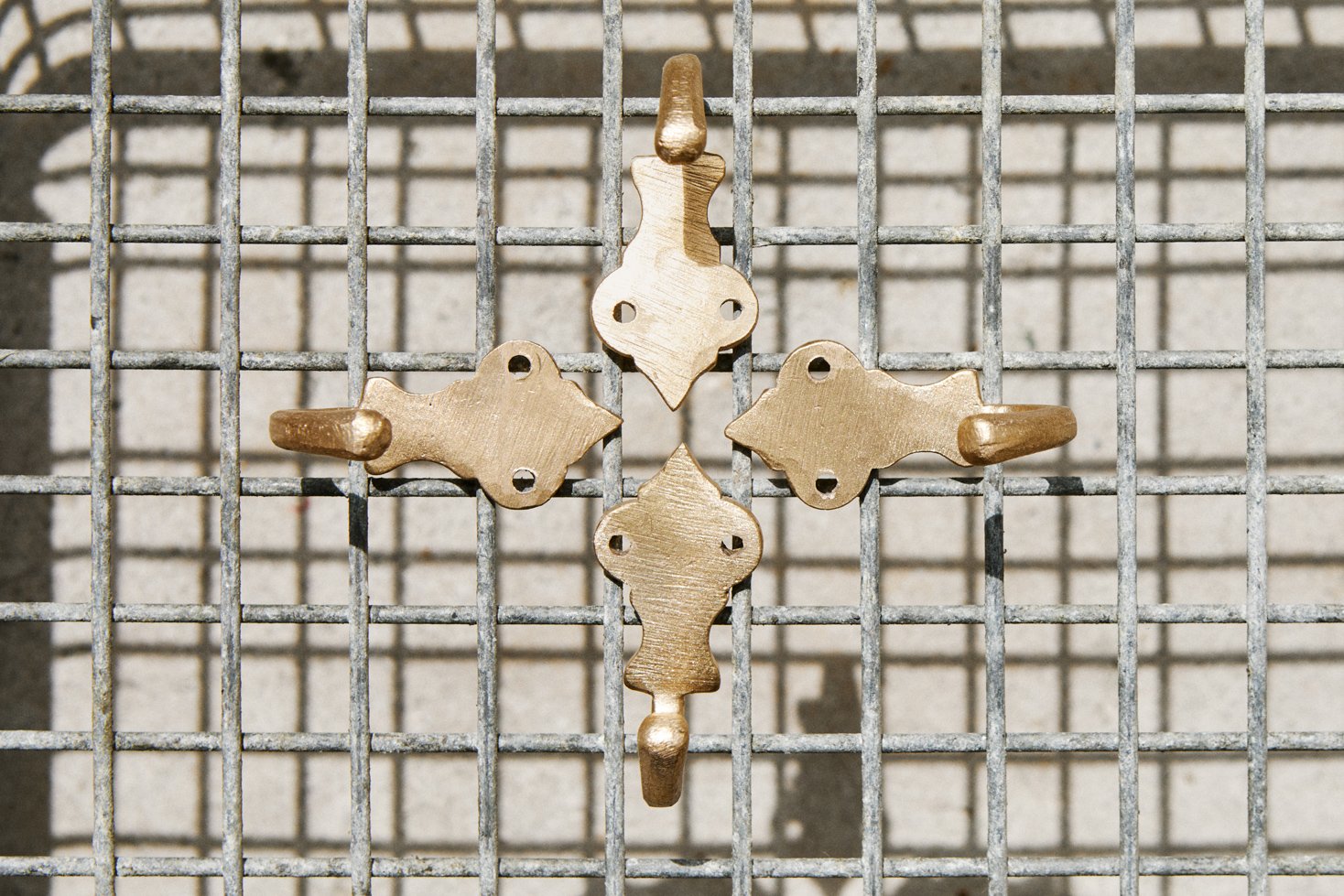 crested-wall-hook-cast-bronze-sandcast-hardware.jpg