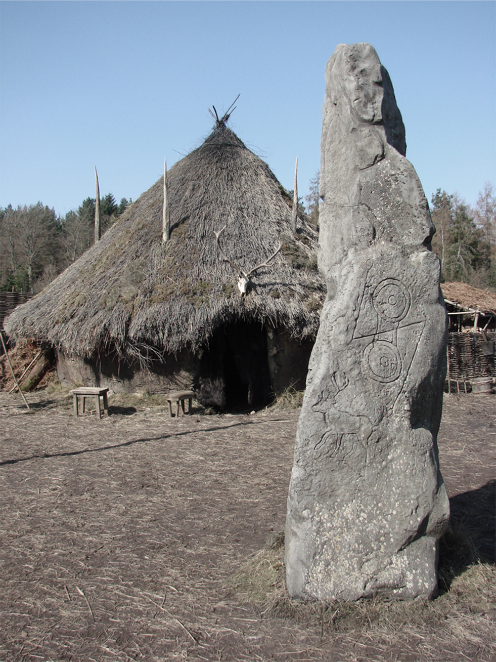 Standing stone decorated with carved Pictish art.