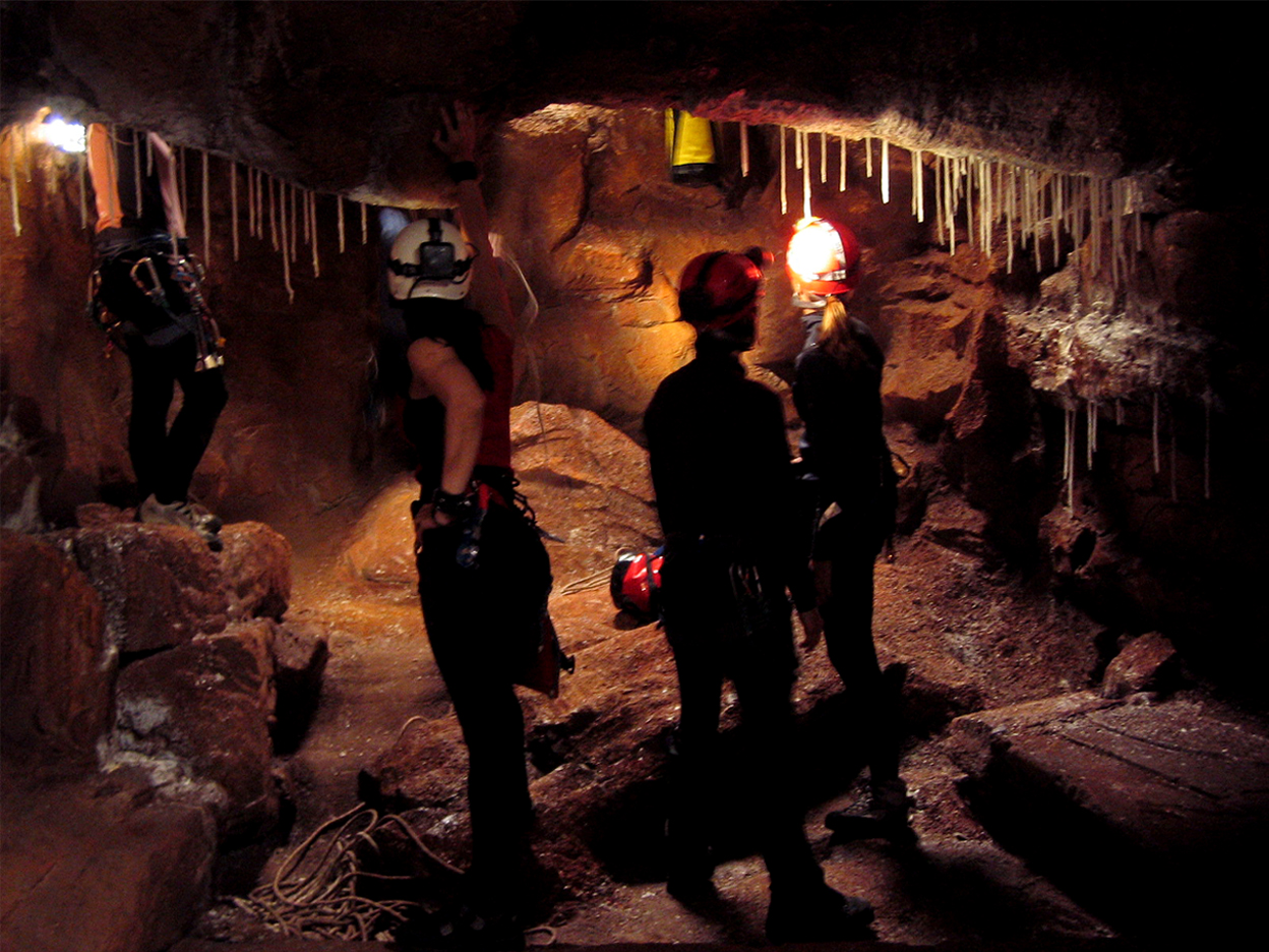Calcite stalactites were made form dipped wax, glowing when backlit by the characters torches and headlamps.