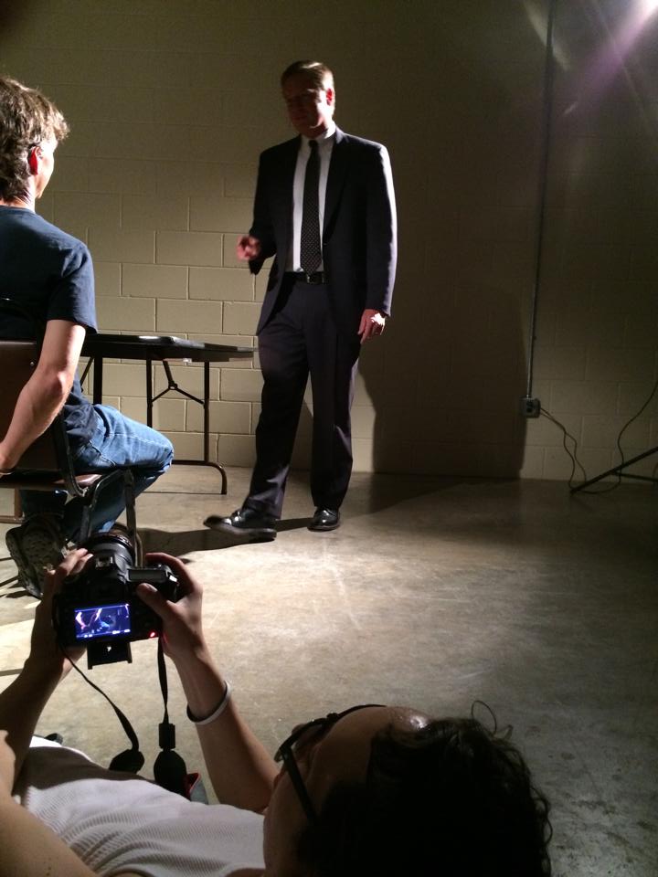 Daniel Lee Perea films a reenactment for I Didn't Do It at the Powerhouse last year. Andy Douglas and Bill Dabney are actors that took part in the filming.