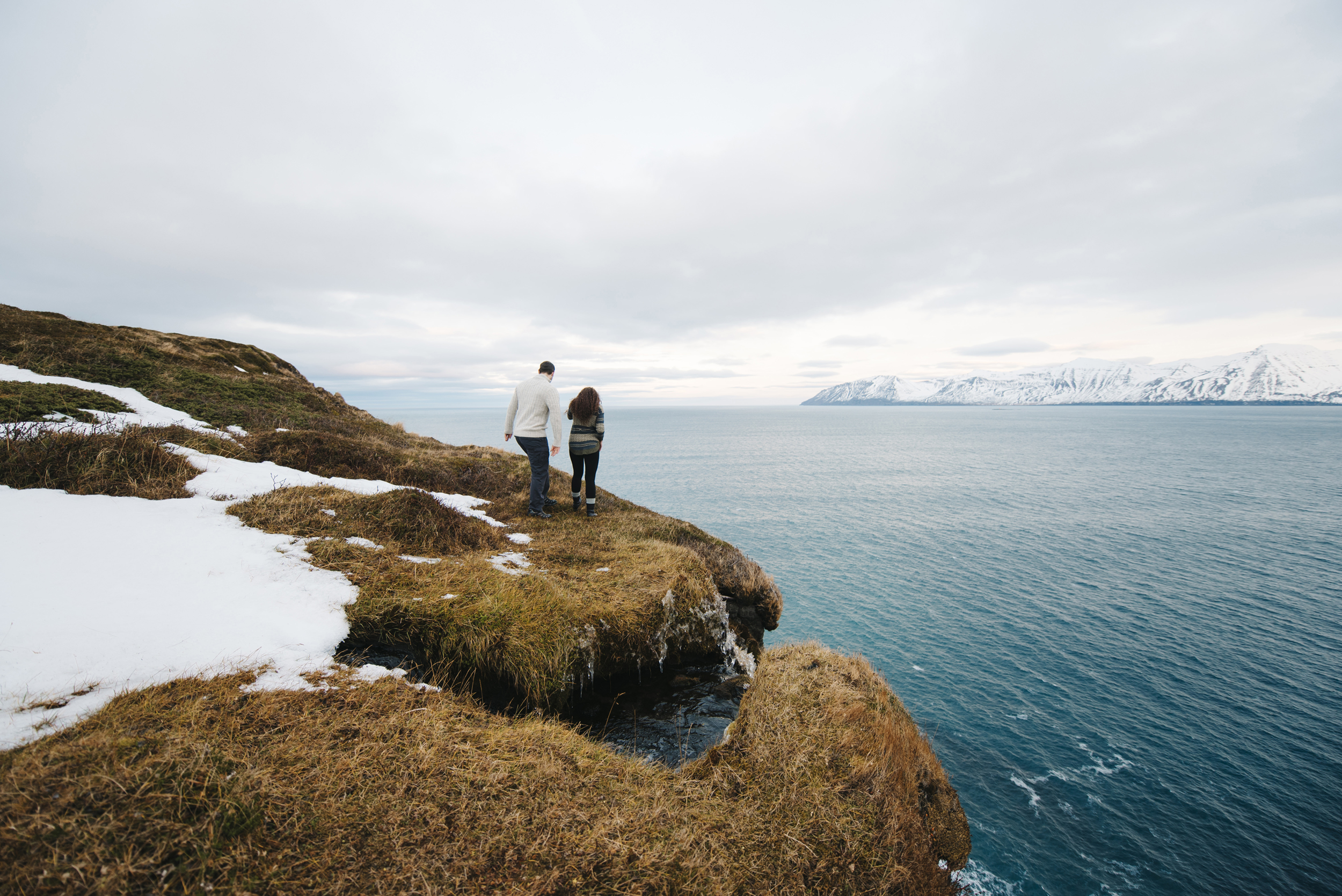 Exploring the Fjords in Northeastern Iceland during honeymoon photography by Iceland Elopement Photographer Colby and Jess colbyandjess.com