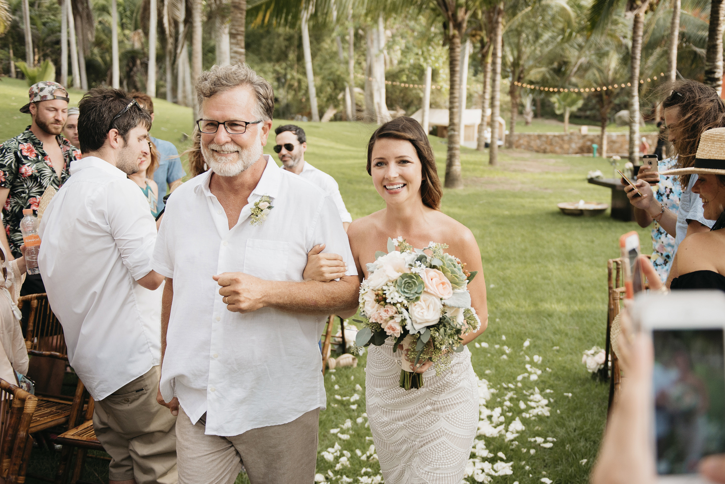 Father walks bride down wedding aisle photography by Sayulita Destination wedding photographers Colby and Jess colbyandjess.com