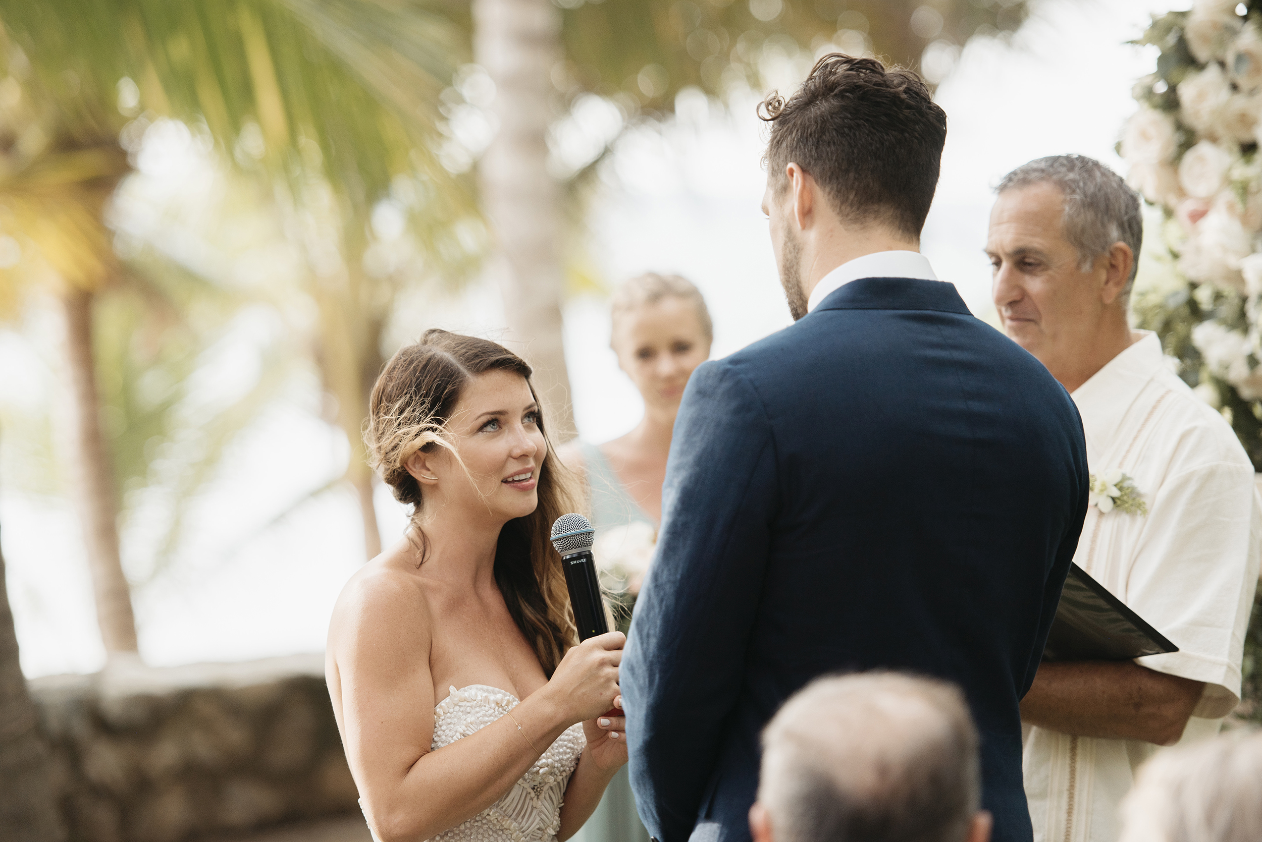 Bride says her vows to groom during Sayulita Ceremony photography by Mexico Destination Photographer Colby and Jess colbyandjess.com