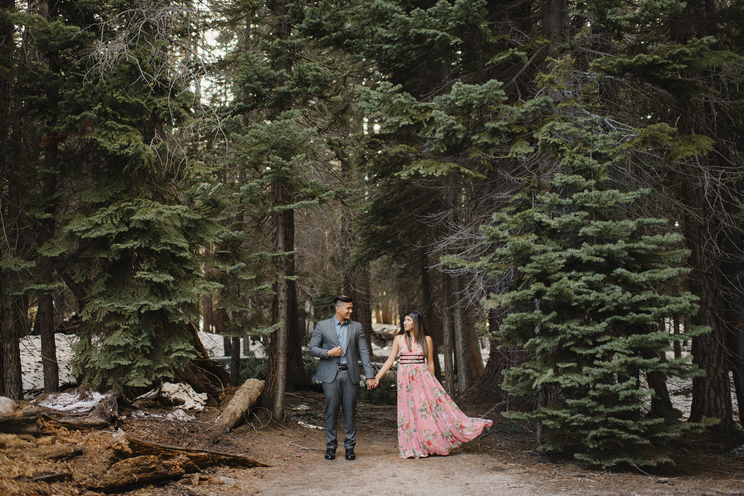 We love how the trail to Taft Point is towered over by tall pine trees. Adventure engagement photos by Yosemite National Park Photographer Colby Moore.  Colby and Jess Photography.  colbyandjess.com 