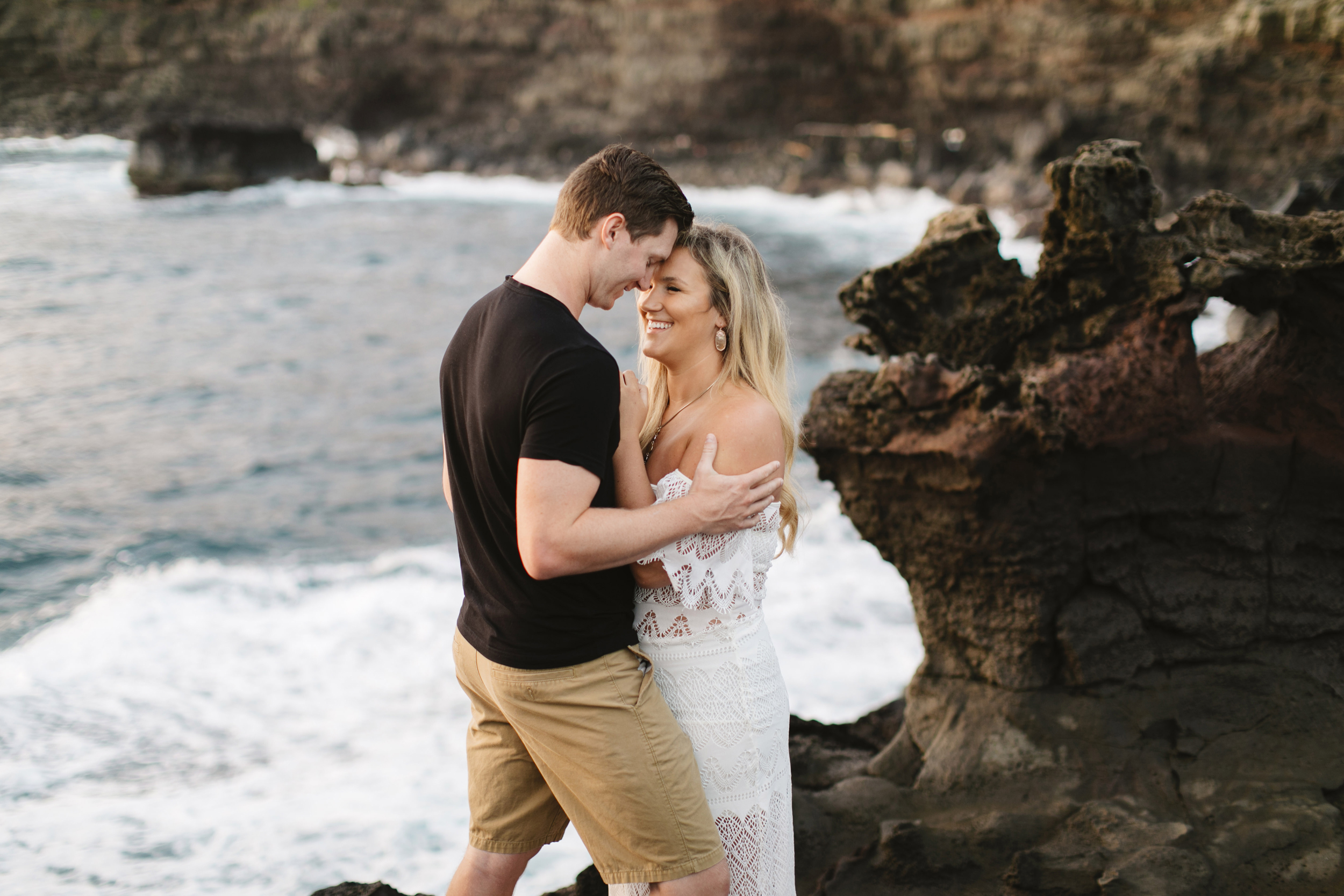 A man and his fiance snuggle during their Maui Adventure Engagement Photography Session by Hawaii Elopement Photographer Colby and Jess