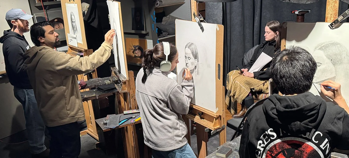 sliders_0002_Students portrait drawing.jpg