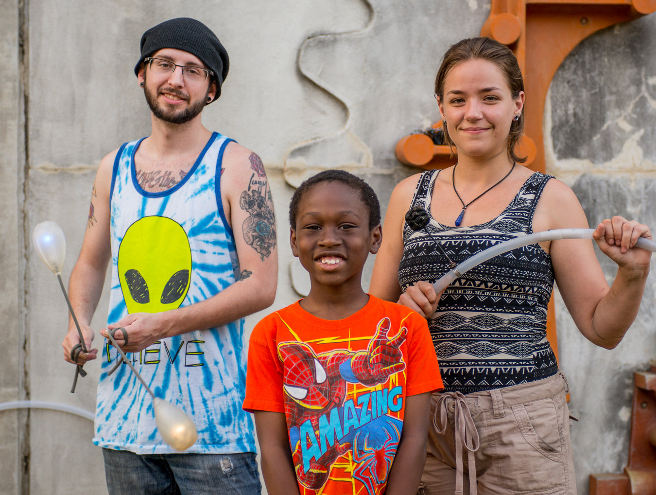 Ryan and Korin, the fire spinners along with a young spectator who wanted his photo taken.
